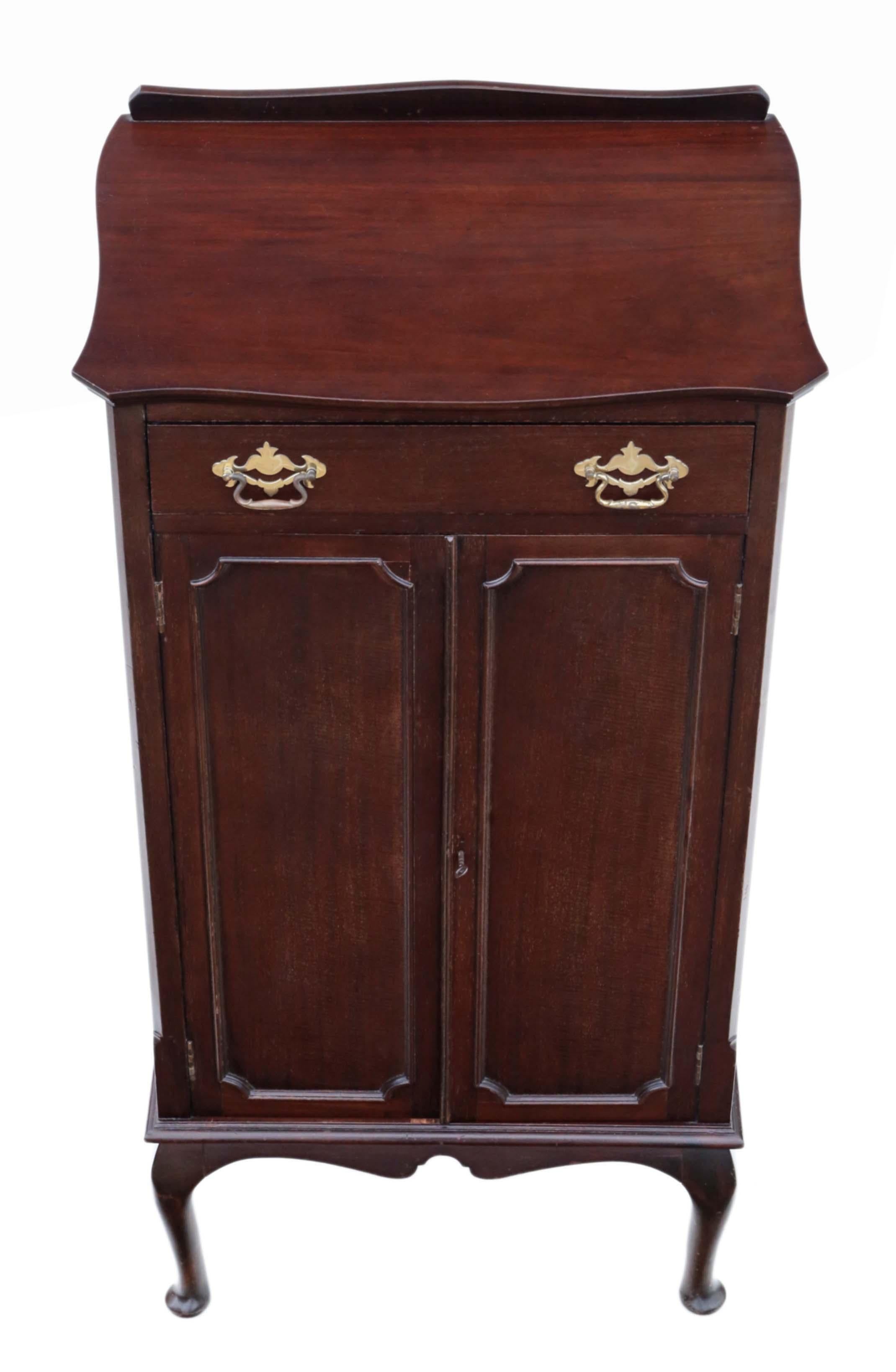 Antique Edwardian C1910 mahogany music cabinet cupboard.

This is a lovely item, that is full of age, charm and character. Traditional top drawer with a drop down front (for sheet music).

Solid, with no loose joints or wobbles.

Would look
