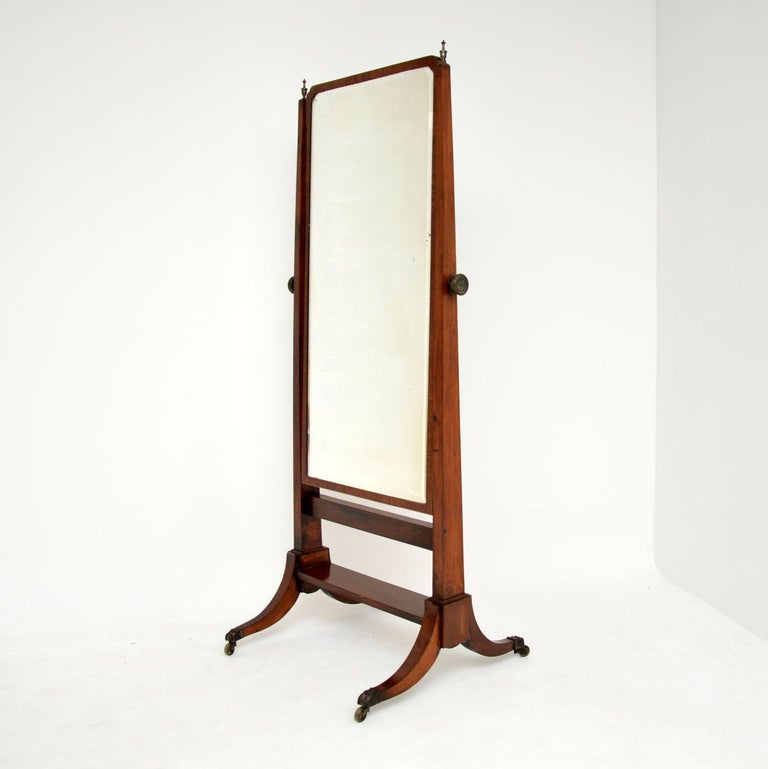A very impressive antique Edwardian cheval mirror. This was made in England, it dates from around 1900-1910.

It is a great size and is of superb quality. The wooden frame has beautiful inlaid satin wood banding around the edges. There are very