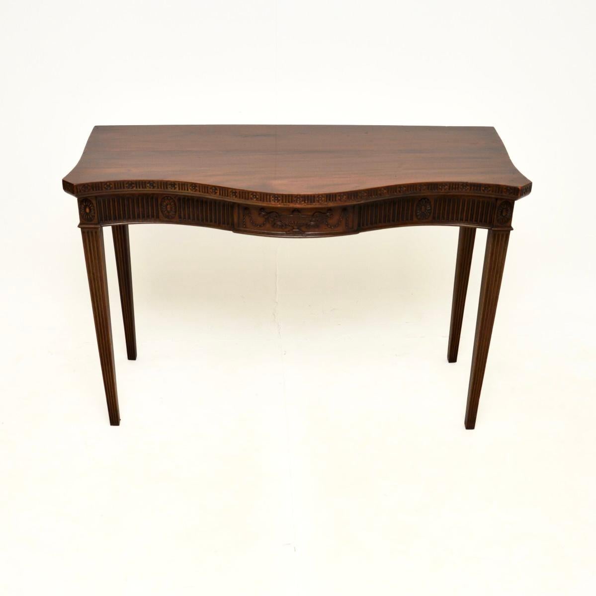 A smart and extremely well made antique Edwardian console table. This was made in England, it dates from around the 1900-1910 period.

The quality is superb and this has very useful proportions, the wood has a gorgeous colour tone and patina. It has