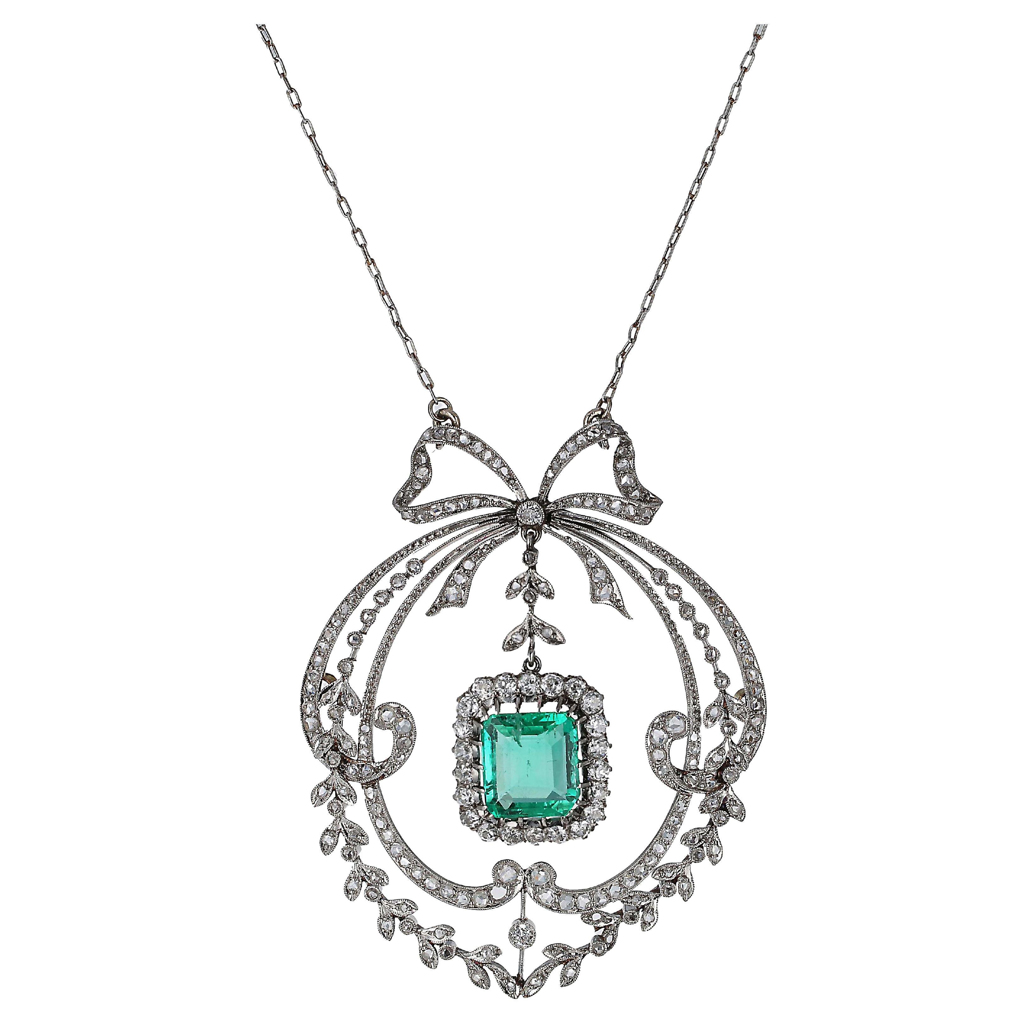 Platinum, white gold, Antique Edwardian diamond, and emerald pendant necklace. The edwardian era was called Belle époque (beautiful era) in France.
The delicate center emerald weighs 3.29 carats and is an old emerald cut. A combination of Old