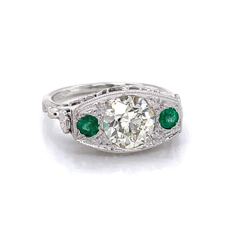 Old Mine Cut Antique Edwardian Diamond Emerald 18 Karat White Gold Filigree Ring For Sale