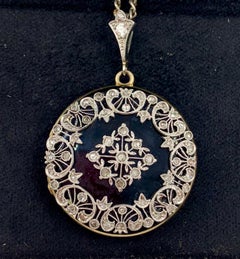 Antico ciondolo edoardiano a doppio medaglione in oro giallo 14K con diamante e platino e smalto