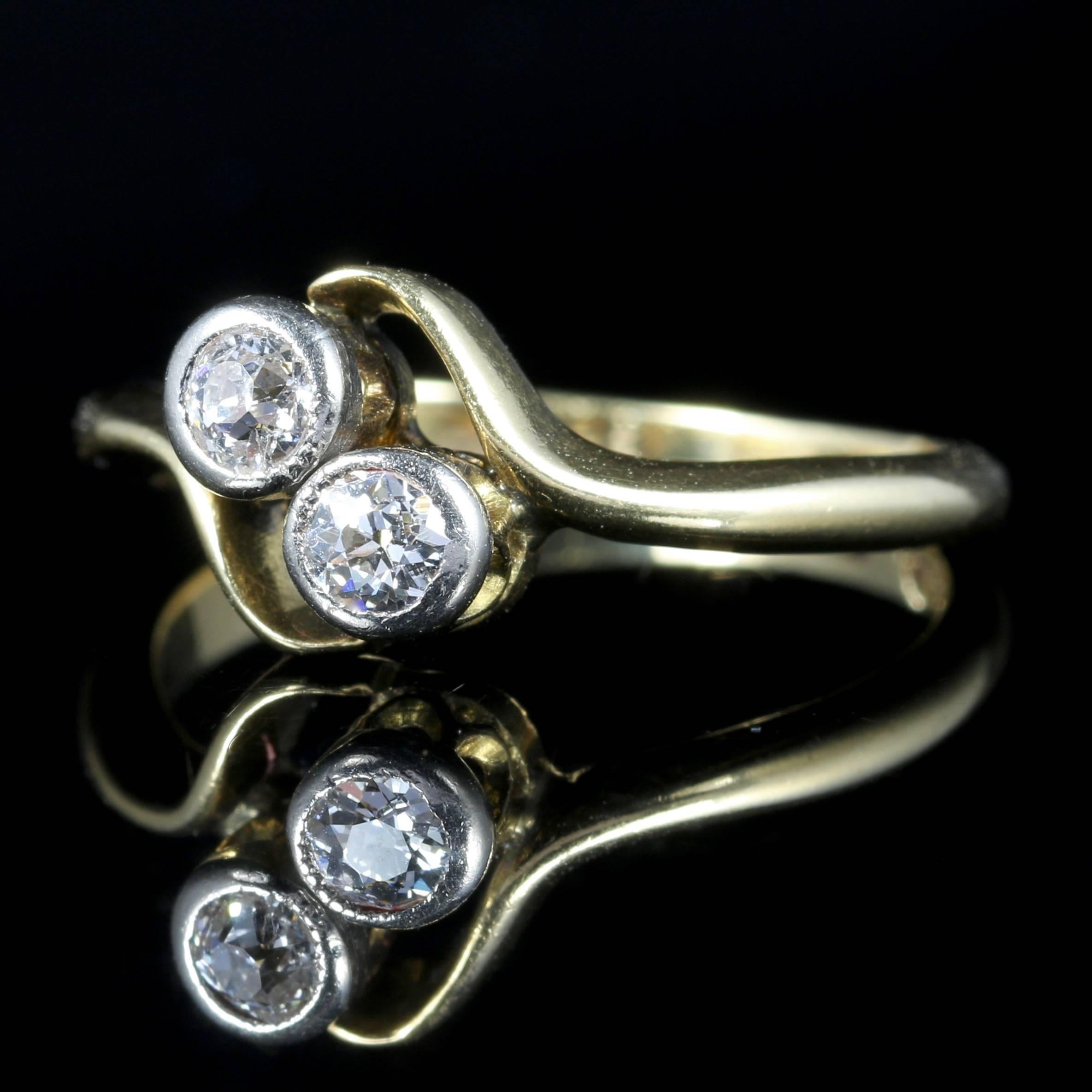 For more details please click continue reading down below...

This fabulous antique Edwardian Diamond twist ring is Circa 1915, set in 18ct Yellow Gold.

Two lovely old cut rub over set Diamonds sit centrally on this antique ring in a little