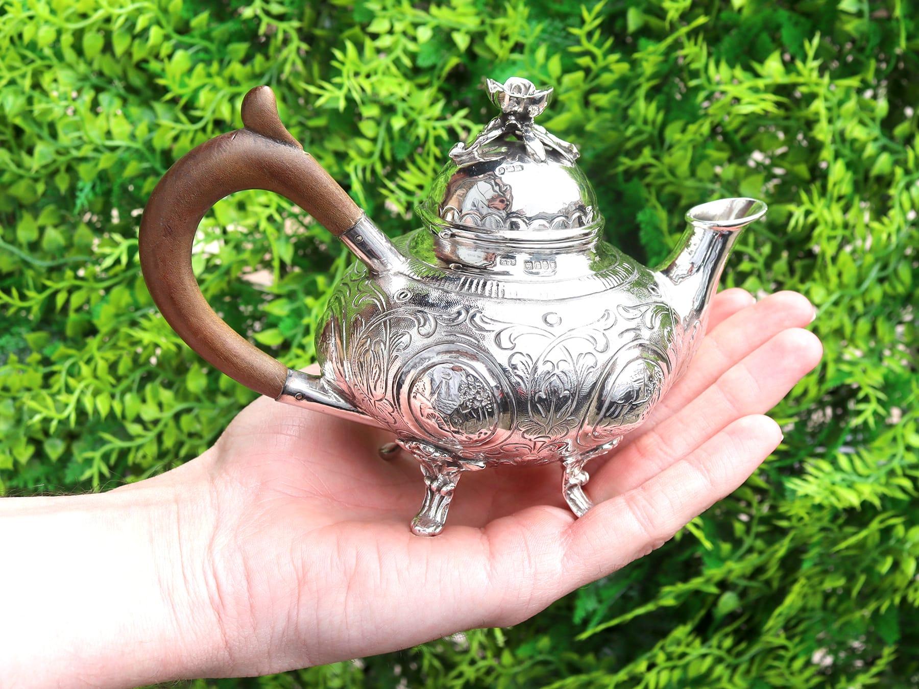 An exceptional, fine and impressive antique Edwardian Dutch sterling silver bachelor teapot; an addition to our silver teaware collection

This exceptional antique Edwardian sterling silver bachelor teapot has a circular cushion shaped form onto