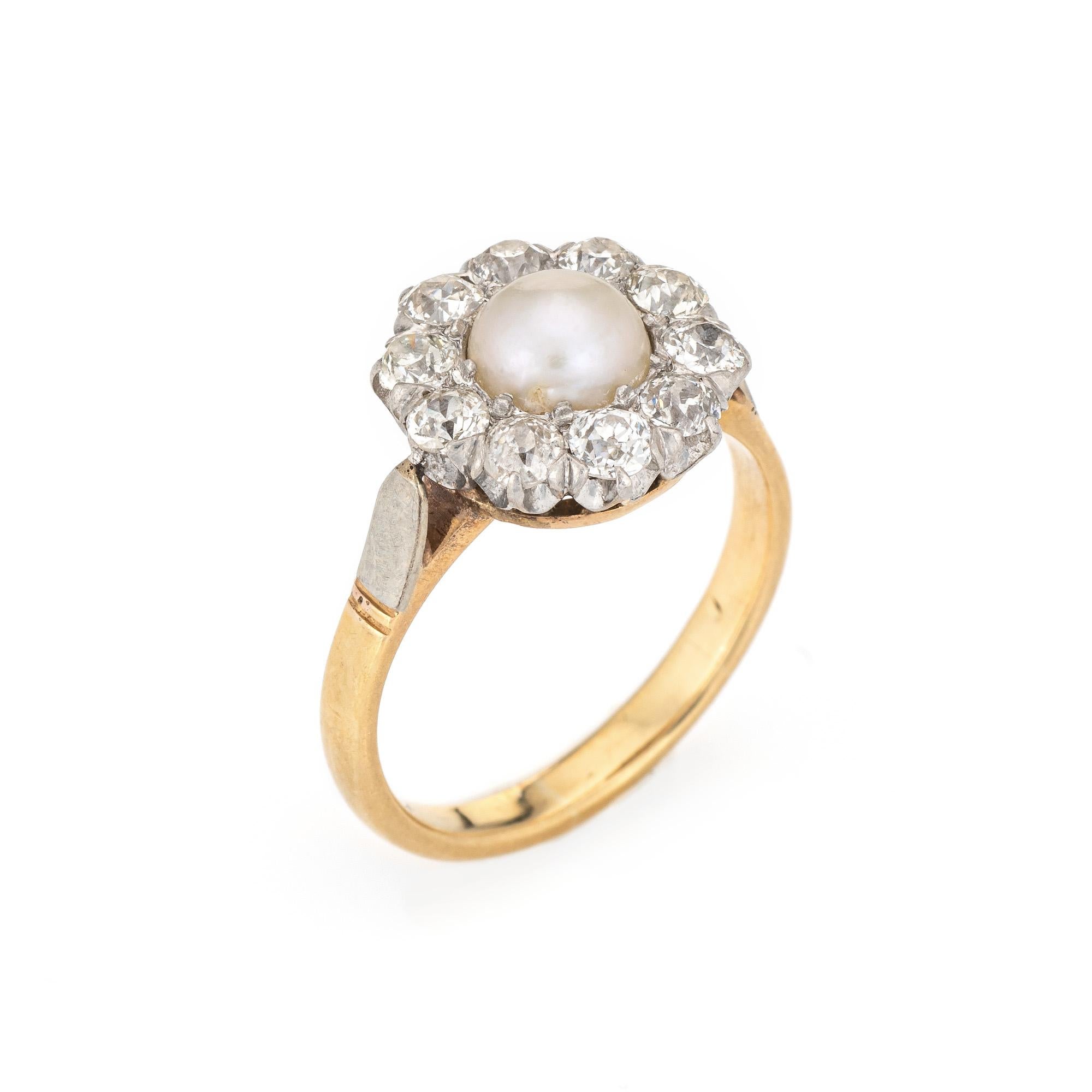Finely detailed antique Edwardian diamond & pearl engagement ring crafted in 18k yellow gold and platinum (circa 1910s).  

Ten old mine cut diamonds are estimated at 0.15 carats each and total an estimated 1.50 carats (estimated at I-J color and