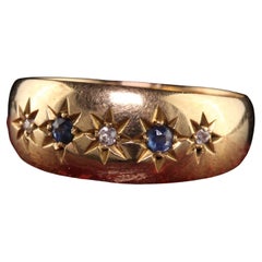 Antiker edwardianischer englischer Ring aus 18 Karat Gelbgold mit Diamanten und Saphiren im alten Minenschliff