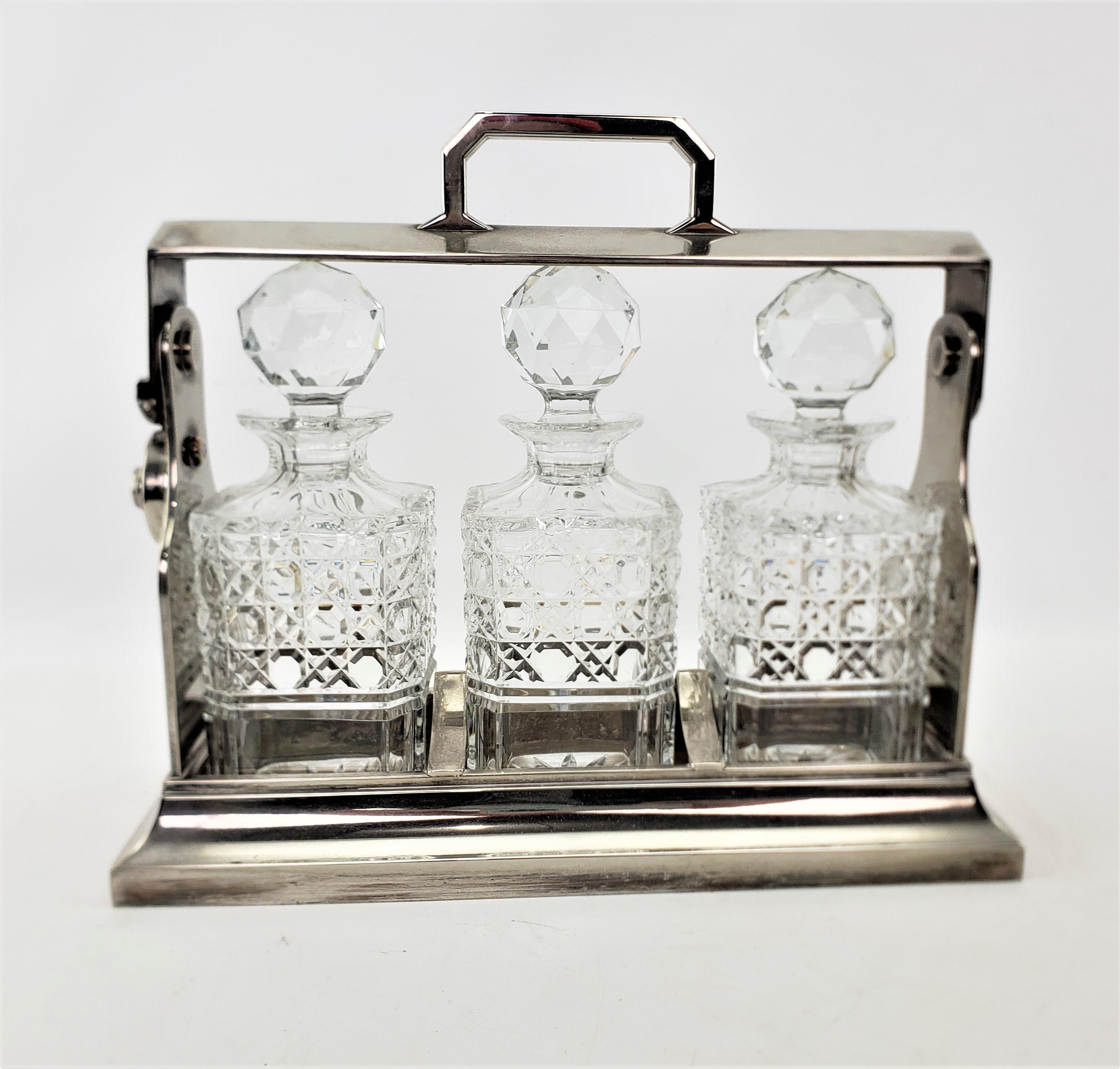 20th Century Antique Edwardian English Silver Plated & Cut Crystal 3 Bottle Tantalus and Key
