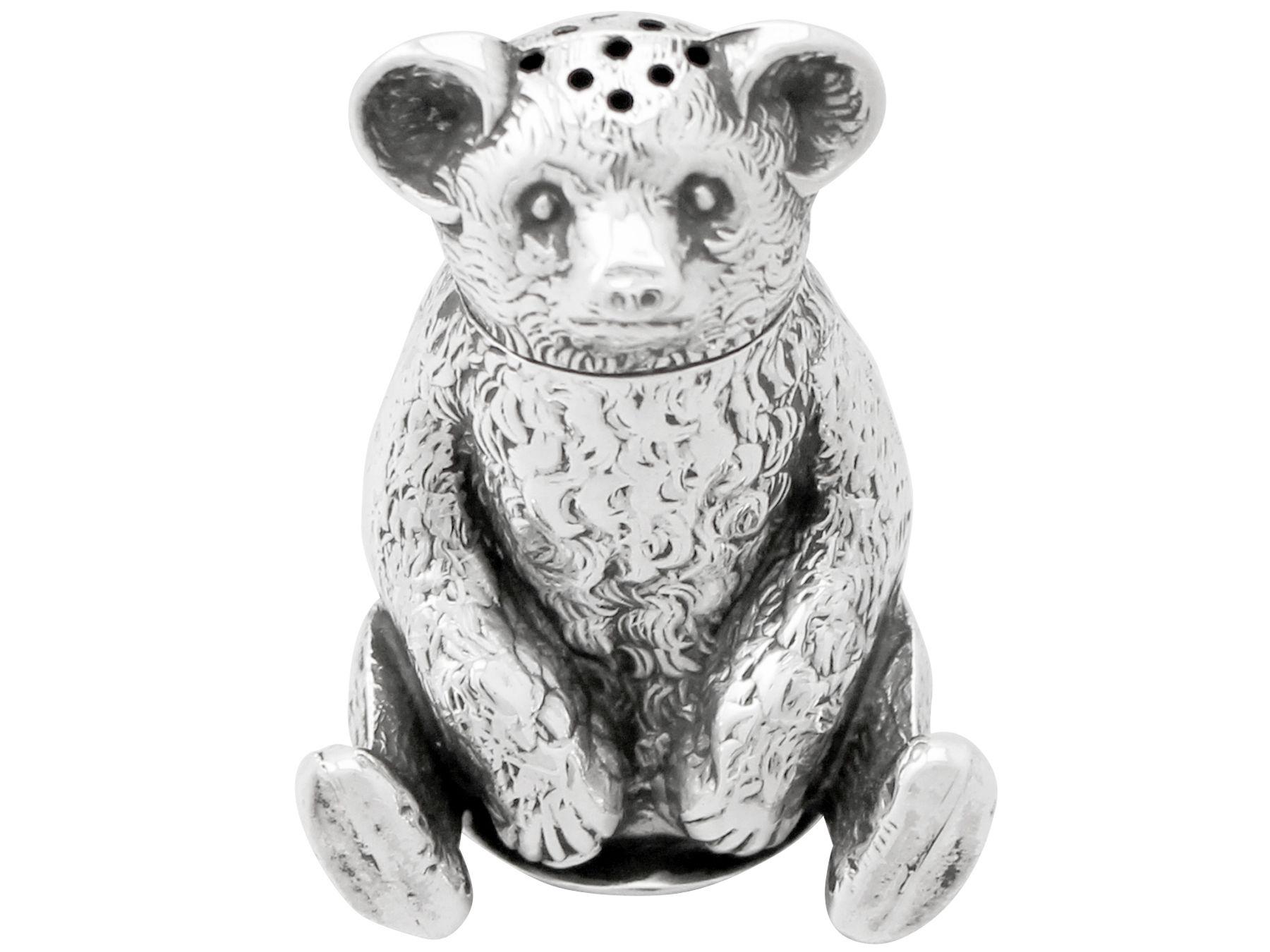 A fine and impressive antique Edwardian English sterling silver pepper shaker realistically modelled in the form of a bear, an addition to our range of silver novelty items

This fine antique Edwardian sterling silver pepperette has been