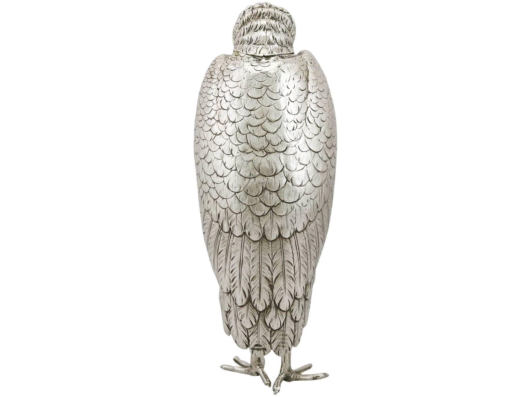 An exceptional, fine and impressive large antique Edwardian English sterling silver sugar box realistically modeled in the form of a striated heron; an addition to our animal related silverware collection

This exceptional antique Edwardian cast