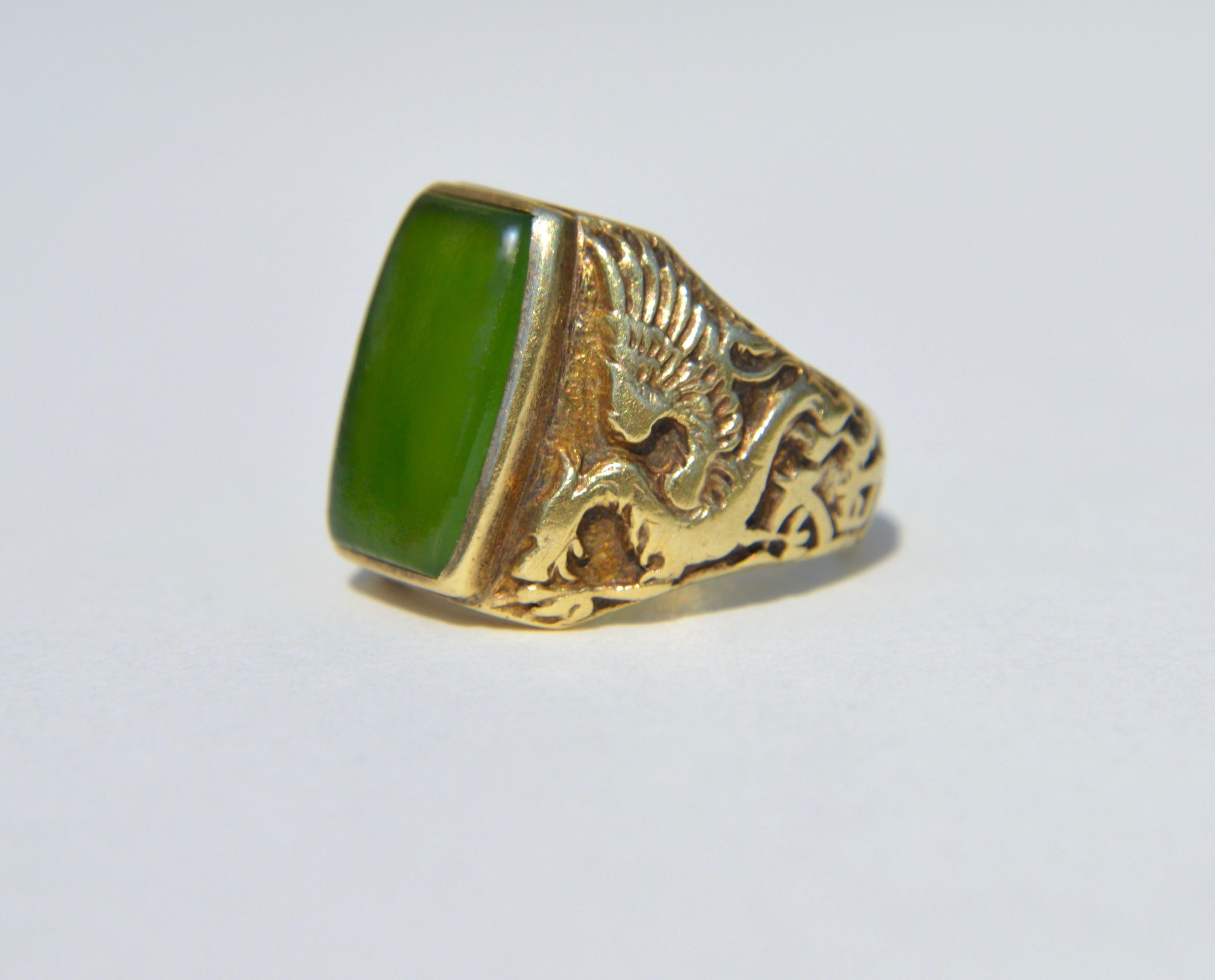 Exceptional and rare Edwardian era circa early 1900s nephrite jade 14K yellow gold griffin shouldered signet ring in size 3.75, perfect for a pinky ring. Can be resized up to 3 sizes up by a jeweler. In good condition. Marked as 14K (faint stamp)