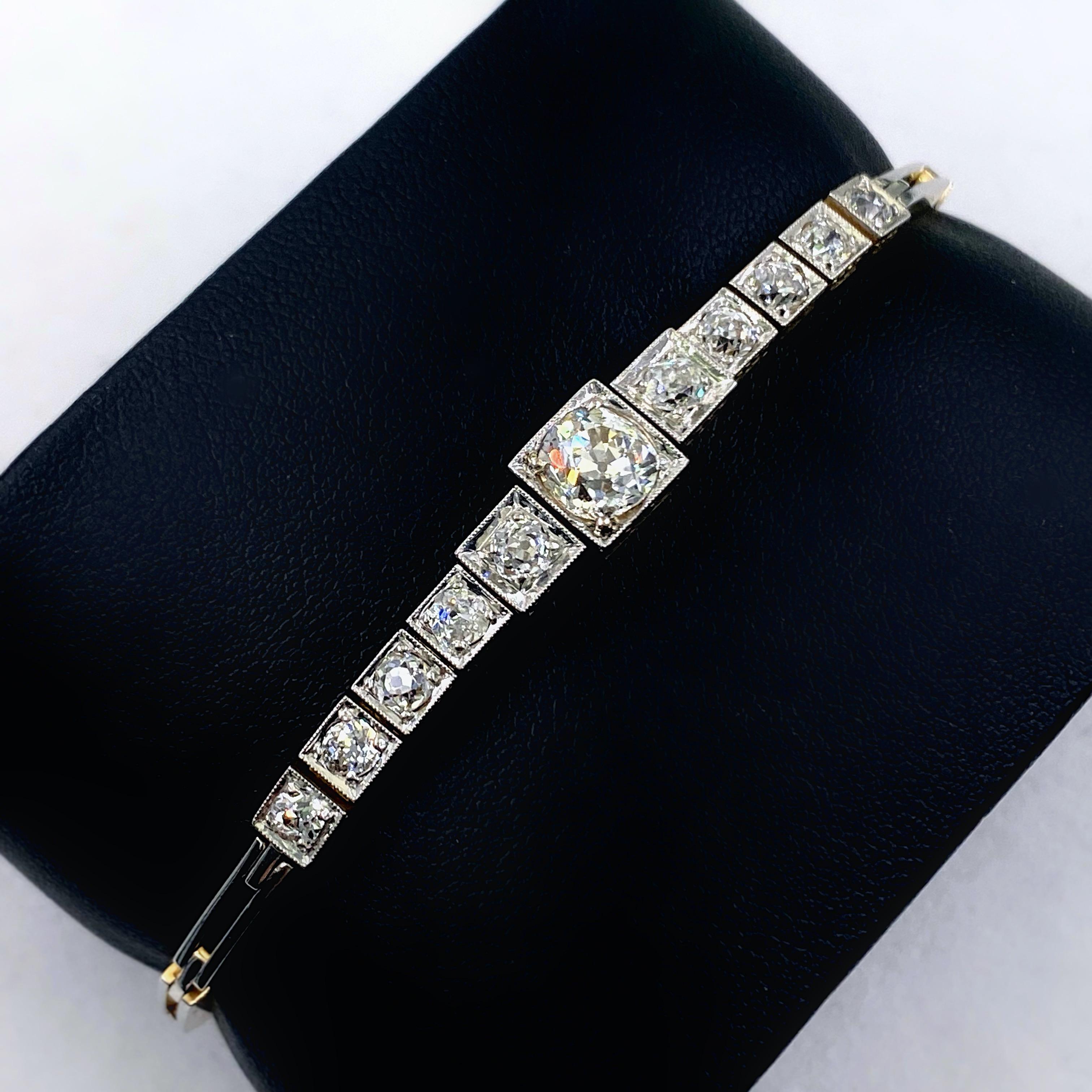 Antique Edwardian Old Mine Cut Diamond Bracelet
Style:  Link Bracelet
Metal:  148 kt White & Yellow Gold
Size / Measurements:  7 inches / 6.9 - 2.55 mm
TCW:  2.35 tcw
Diamonds:  11 Old Mine Cut Diamonds 
Color & Clarity:ting:  I - J / VS2 -