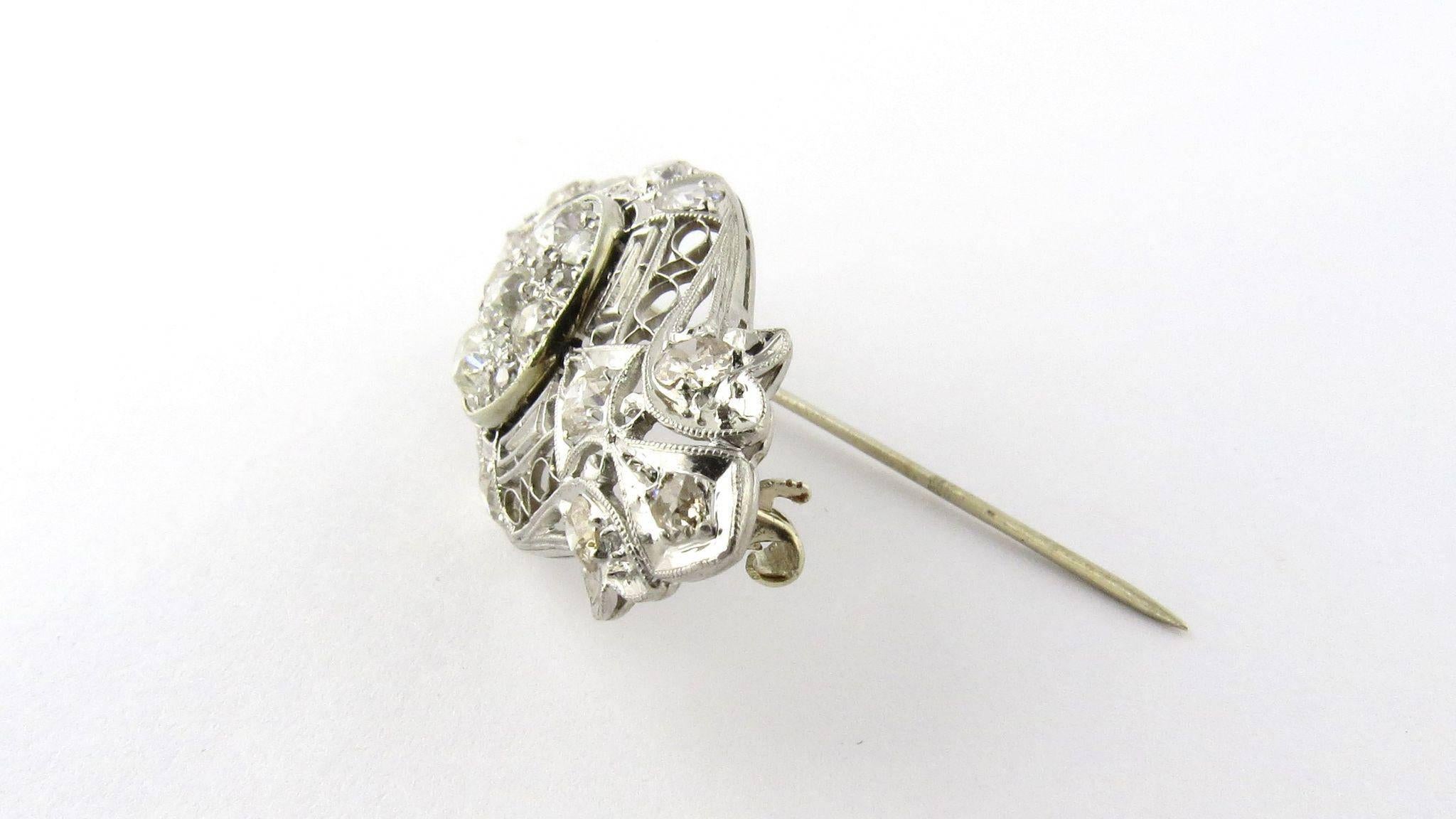 Antique Edwardian Era Platinum and 14K White Gold Diamond Brooch Pin. 

Stunning example of Edwardian Era beauty, this brooch boasts of 3.25 total carat weight in diamonds. 

Circa 1900. 

Pin and clasp are marked 14K and brooch has been tested as