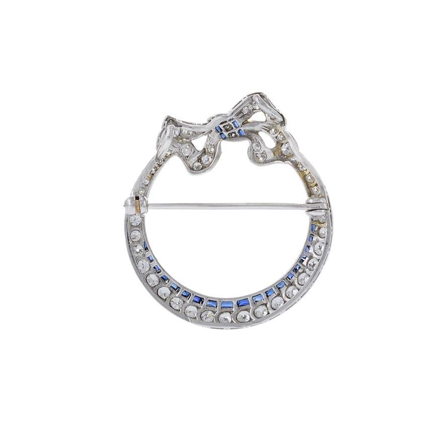 Antique Edwardian Era Platinum Sapphire and Diamond Circle Bow Lapel Pin For Sale 1