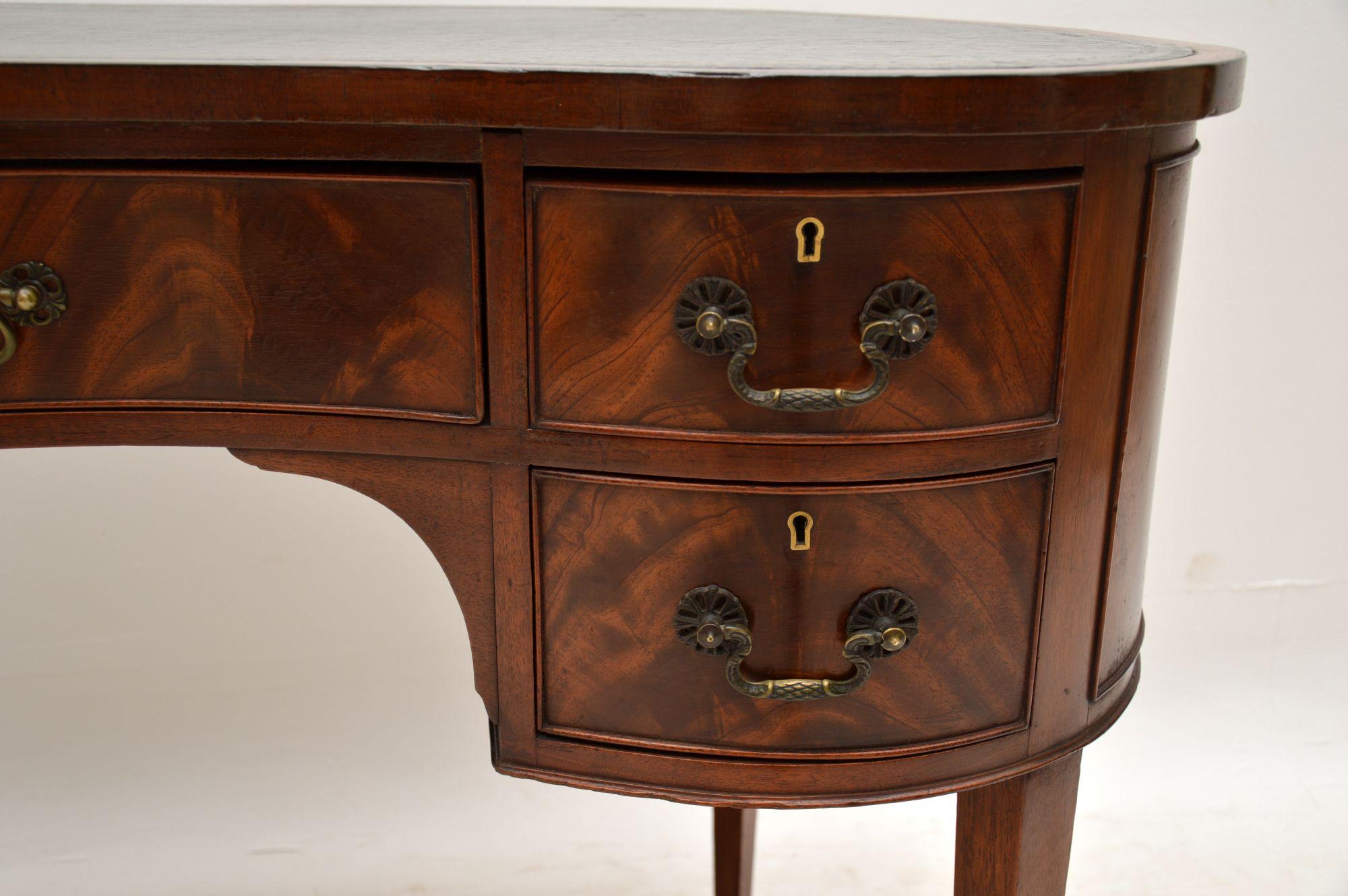 20th Century Antique Edwardian Flame Mahogany Leather Top Desk