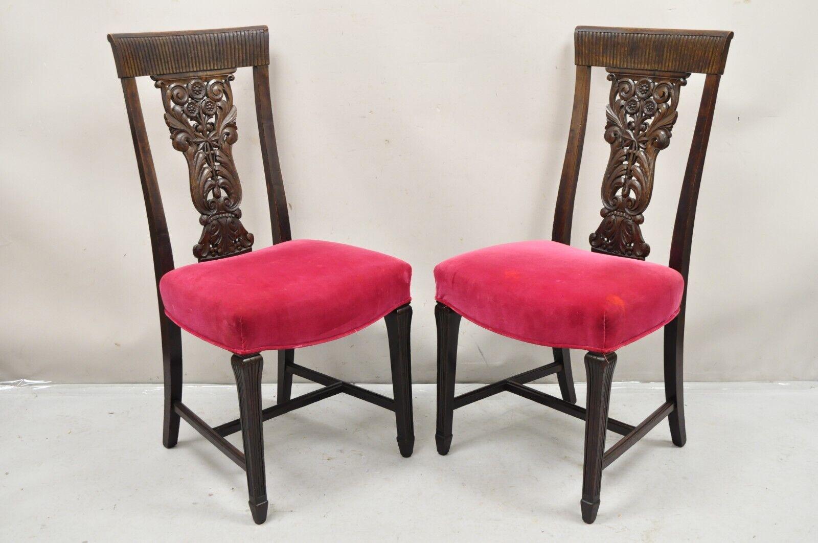 Antique Edwardian Floral Carved Mahogany Red Mohair Dining Chairs - Set of 4. Item features solid wood frames, floral carved front and back, stretcher base, very nice antique set. Circa  Early 1900s. Measurements: 40.5