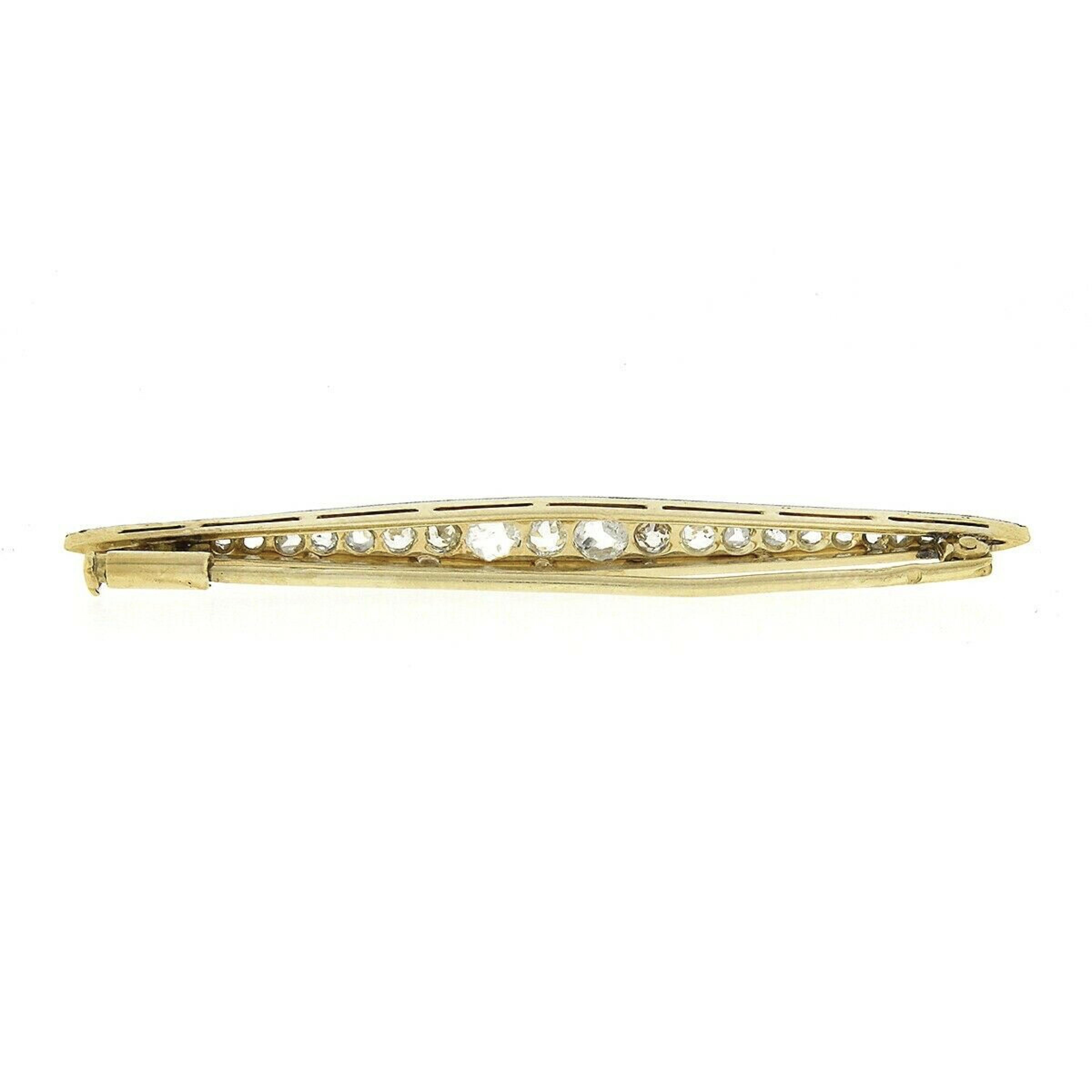 This elegant antique bar pin was crafted in France during the Edwardian era from solid 18k yellow gold with a platinum top and features approximately 0.85 carats of fine quality diamonds neatly pave set throughout. The gorgeous diamonds are old