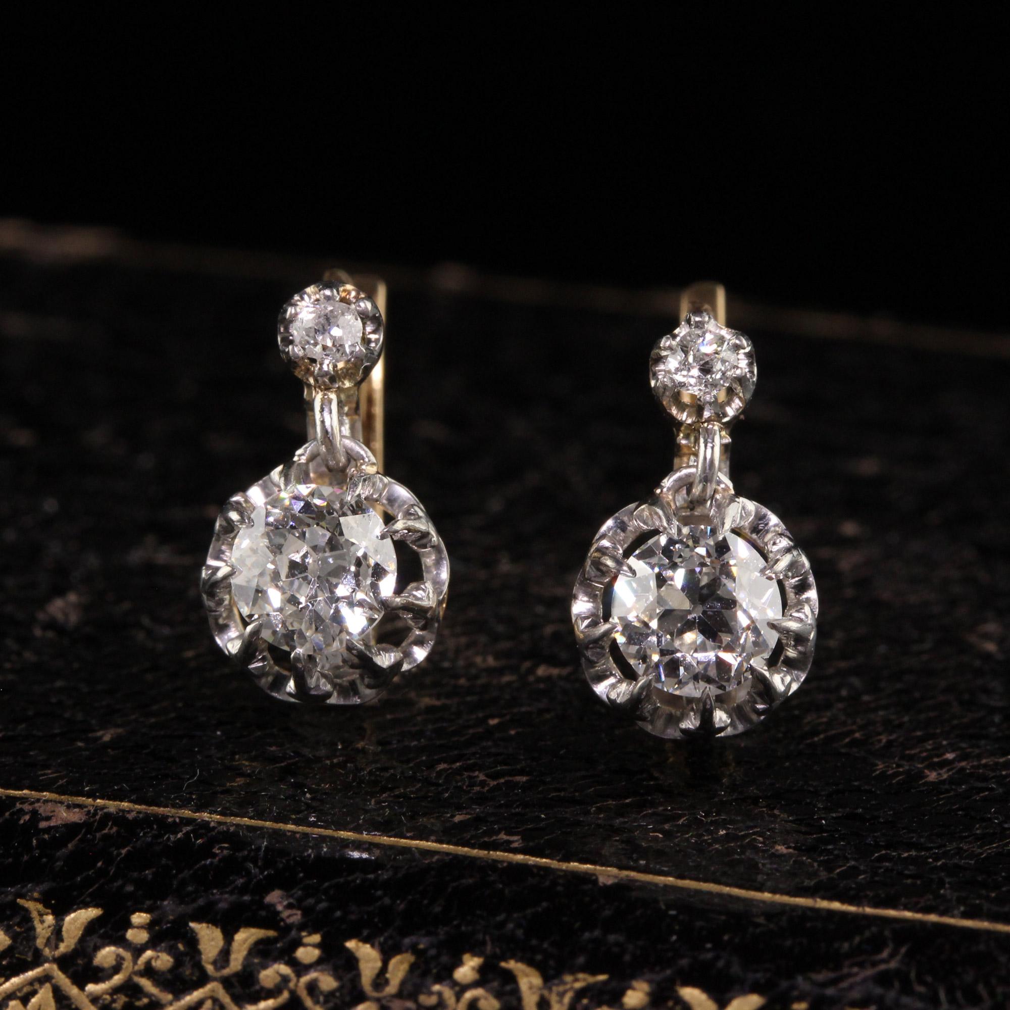 Beautiful Antique Edwardian French 18K Yellow Gold Old European Diamond Earrings - GIA. These beautiful earrings are crafted in 18k yellow gold and platinum. The earrings have French hallmarks and the bottom center stones are both GIA certified.