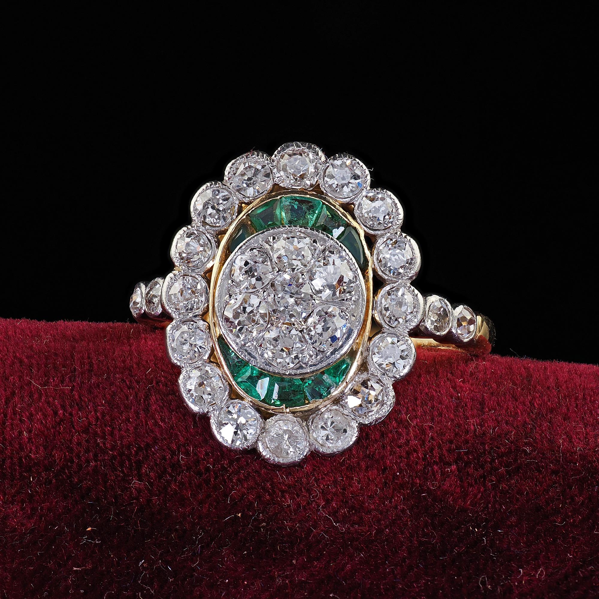 Beautiful Antique Edwardian French 18K Yellow Gold Platinum Diamond and Emerald Ring. This gorgeous Edwardian French diamond and emerald ring is crafted in 18k yellow gold and platinum top. The ring features gorgeous chunky old mine cut diamonds set