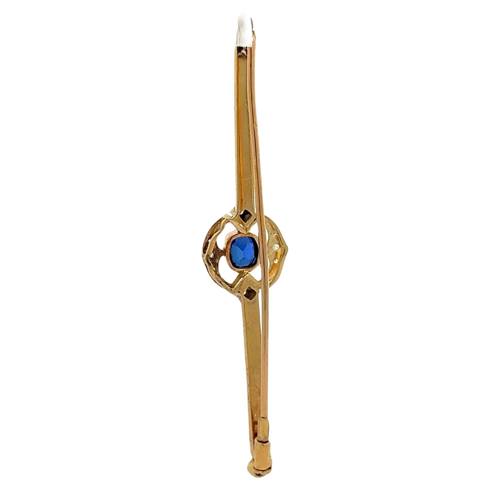–Stone(s)–
(1) Synthetic Sapphire - Old Cushion Cut - Bezel Set - Deep Blue Color - 4.1 x 5.1mm (approx.)
(10) Natural Genuine Diamond - Rose Cut - Pave Set - White Color

Material: 18k Yellow Gold - Platinum top
Weight: 5.62 Grams
Overall Height: