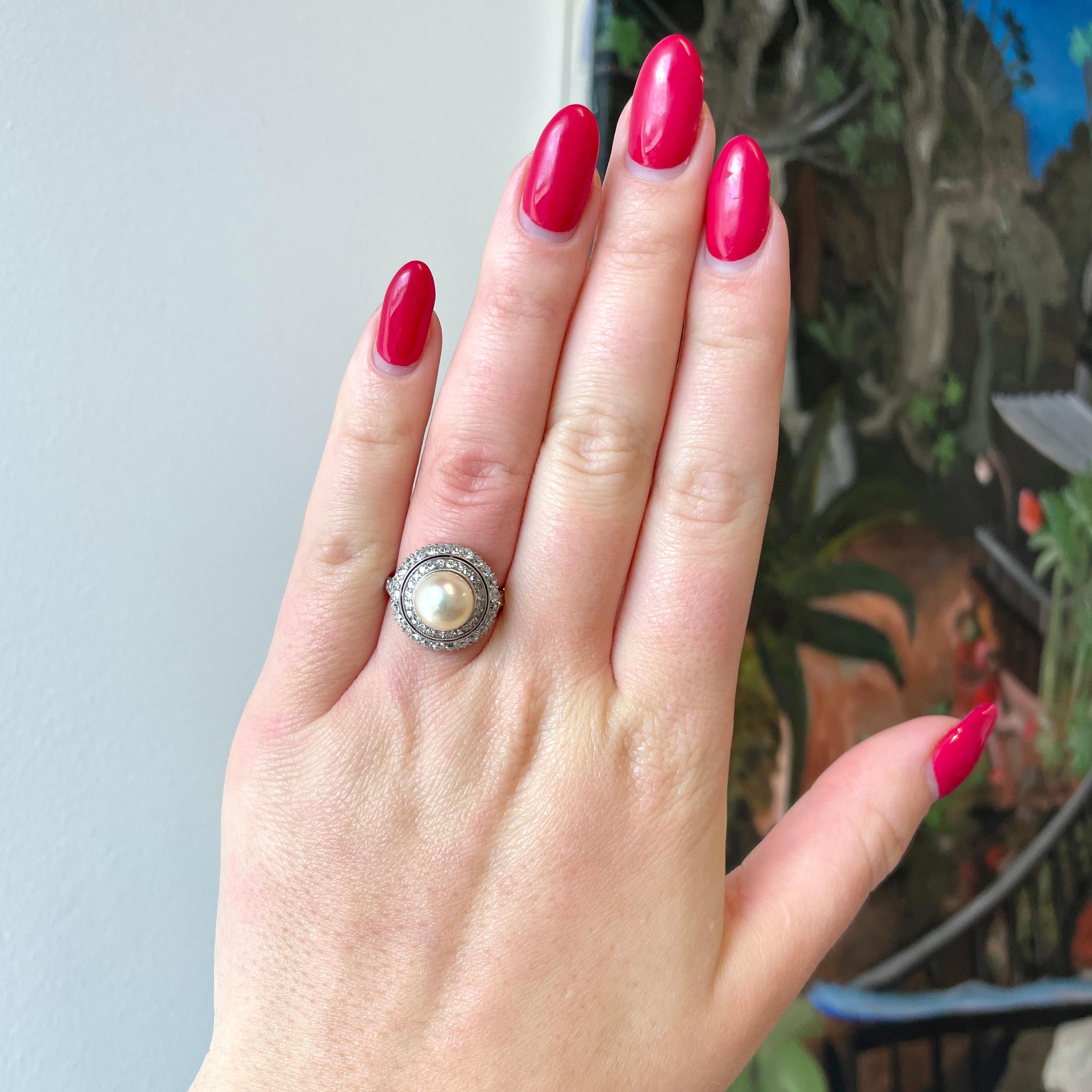 You'll love wearing this stunning Antique Edwardian GIA Pearl Diamond Platinum Cluster Ring. You can be elegant or dressed down and today pearls are actively used in fashion as a unique, stylish and elegant accent. This ring is extremely feminine