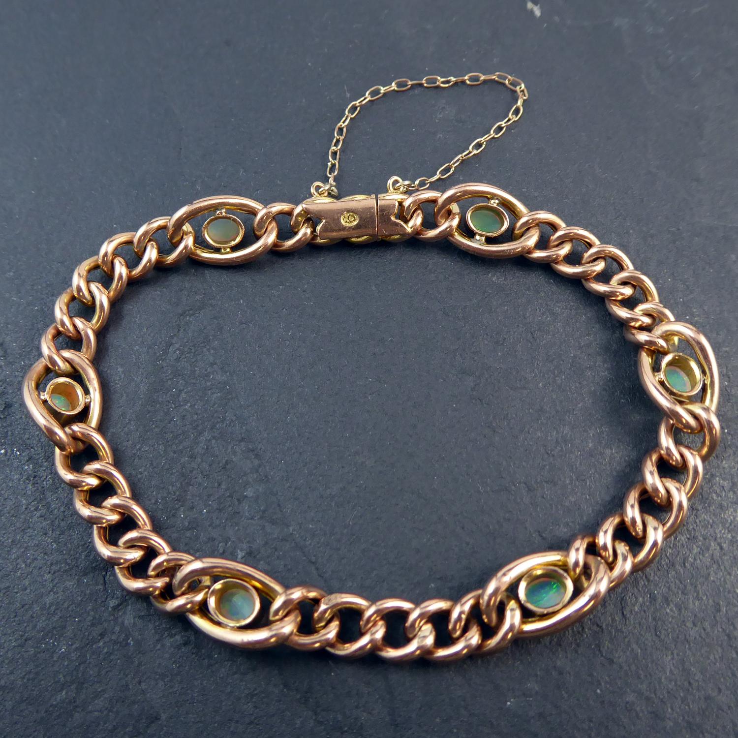 Oval Cut Antique Edwardian Gold Curb Link Bracelet with Cabochon Opals