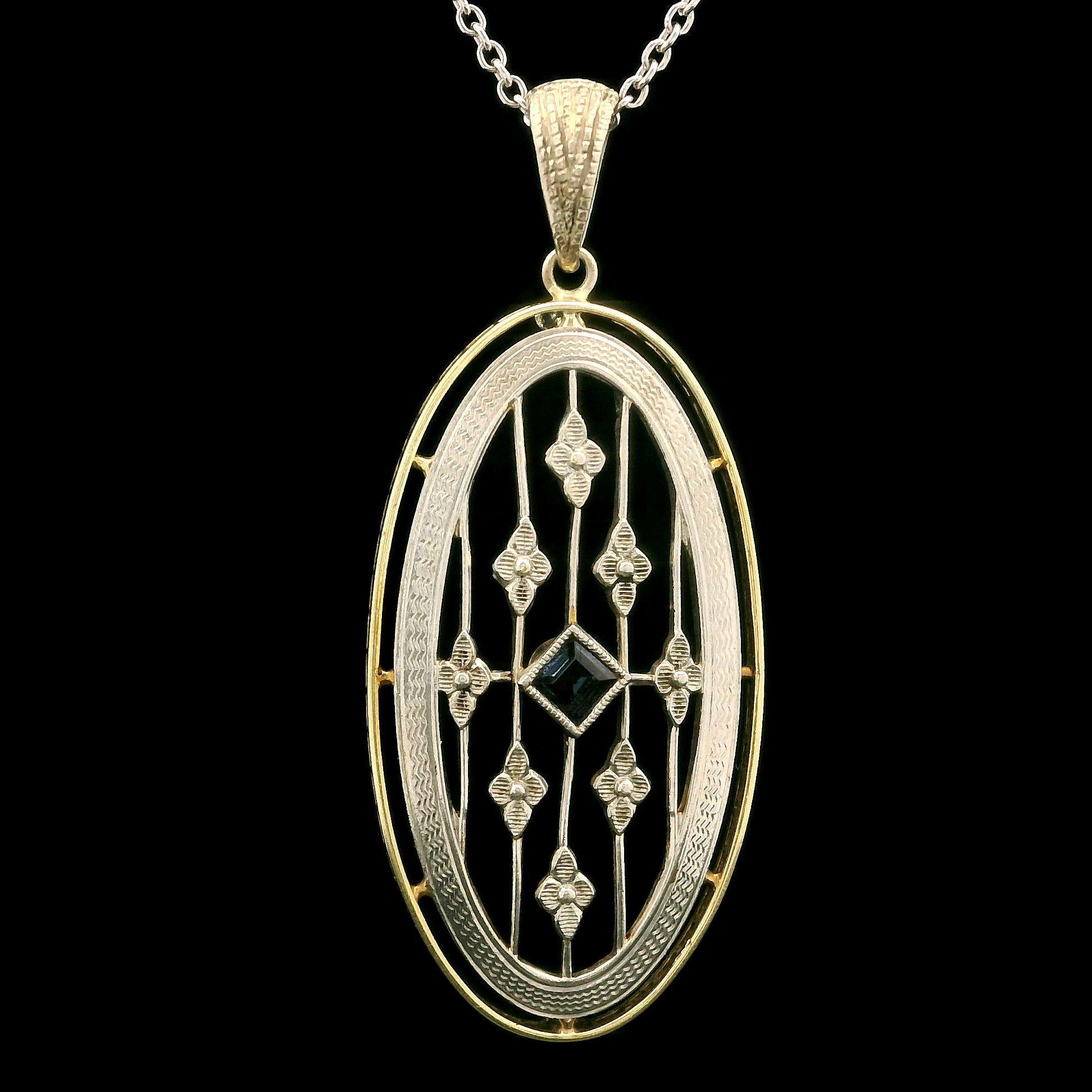 --Stone(s):--
(1) Blue Stone - Square Step Cut - Miglrain Bezel Set - Blue Color - 3.4x3.4mm (approx.)

Material: Solid 4 Yellow Gold Frame w/ Platinum Top & 14k White Gold Chain
Weight: 4.29 Grams
Chain Type: 0.6mm Cable Link
Chain Length:
