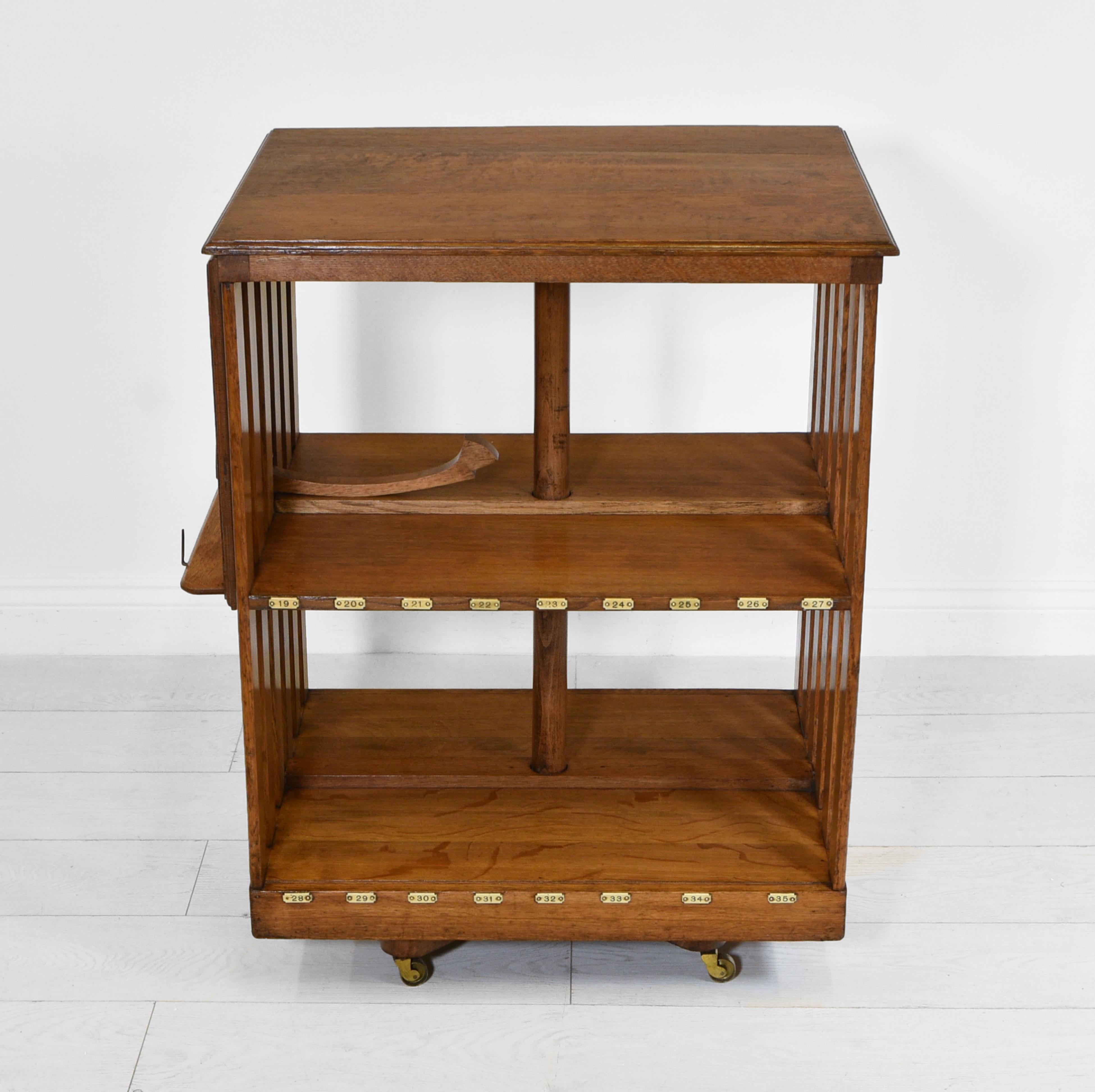 Antique Edwardian Golden Oak Revolving Library Bookcase with Bookrest In Good Condition In Norwich, GB
