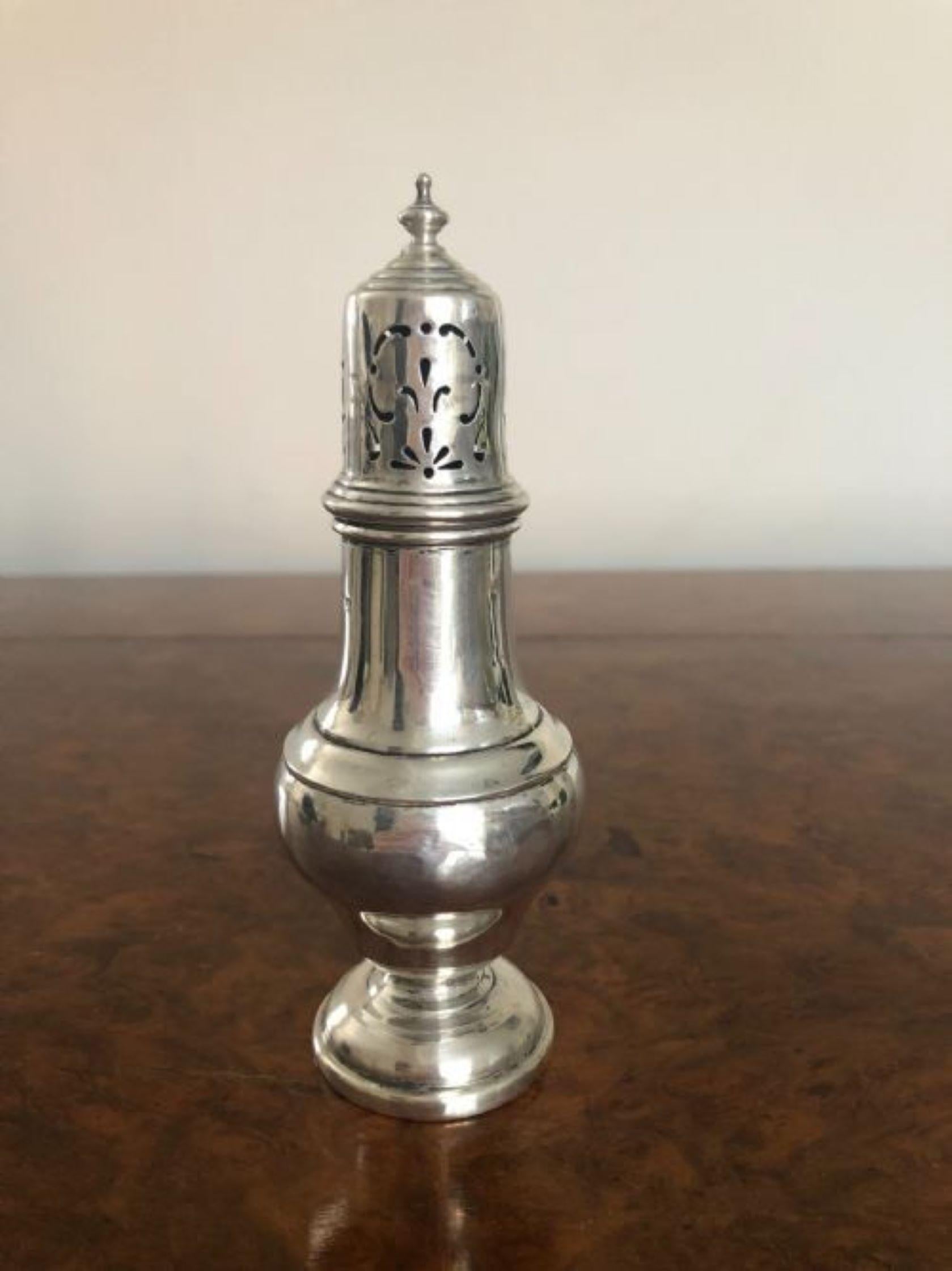 Antique Edwardian hall marked silver sugar sifter, having a pierced removable top above a shaped vessel on a circular base