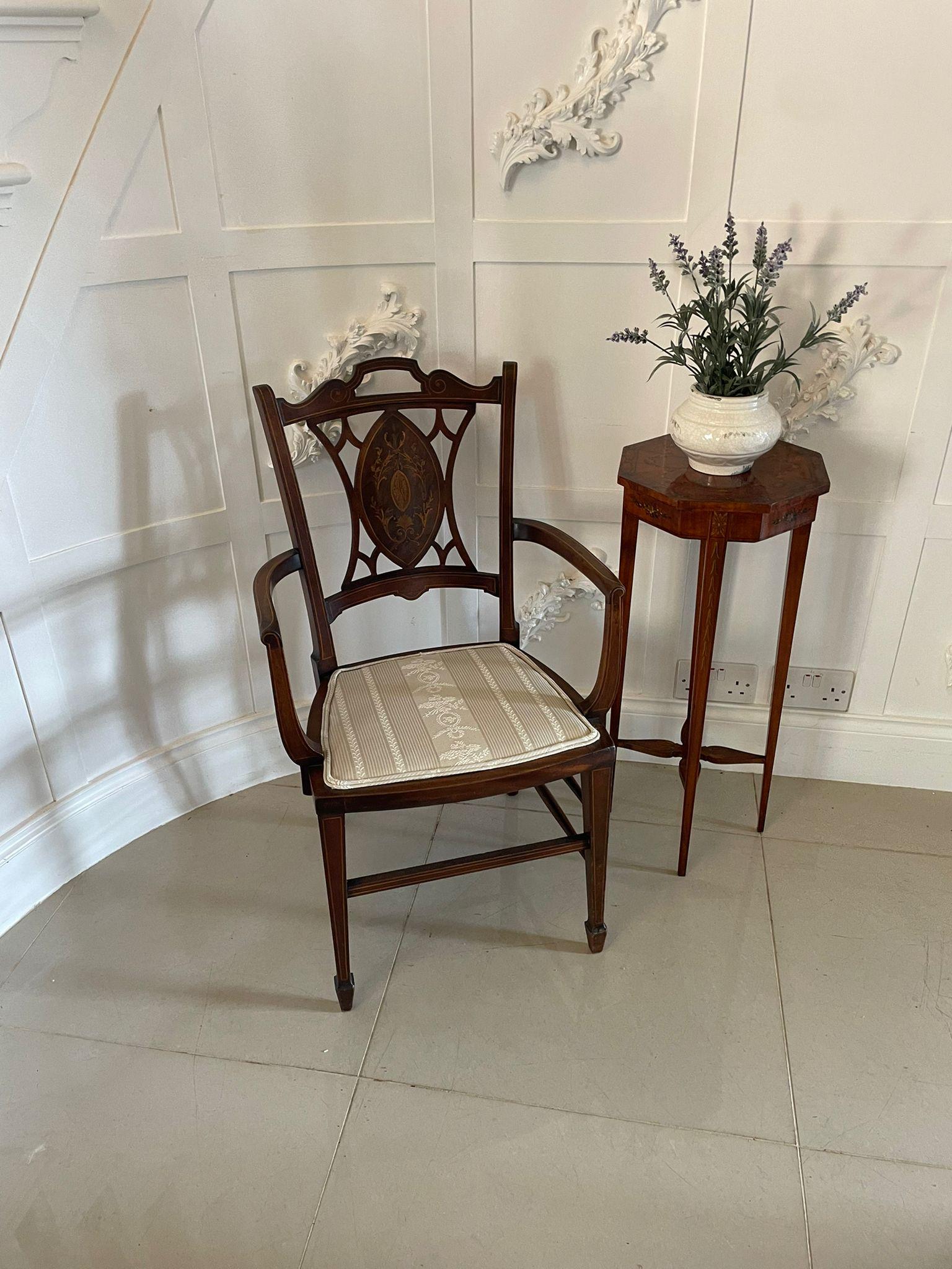 Antique Edwardian inlaid mahogany armchair having an attractive quality inlaid mahogany shaped top rail and open pierced work decoration, beautiful oval inlaid mahogany panel to the centre of the back with pierced carving, shaped open arms with
