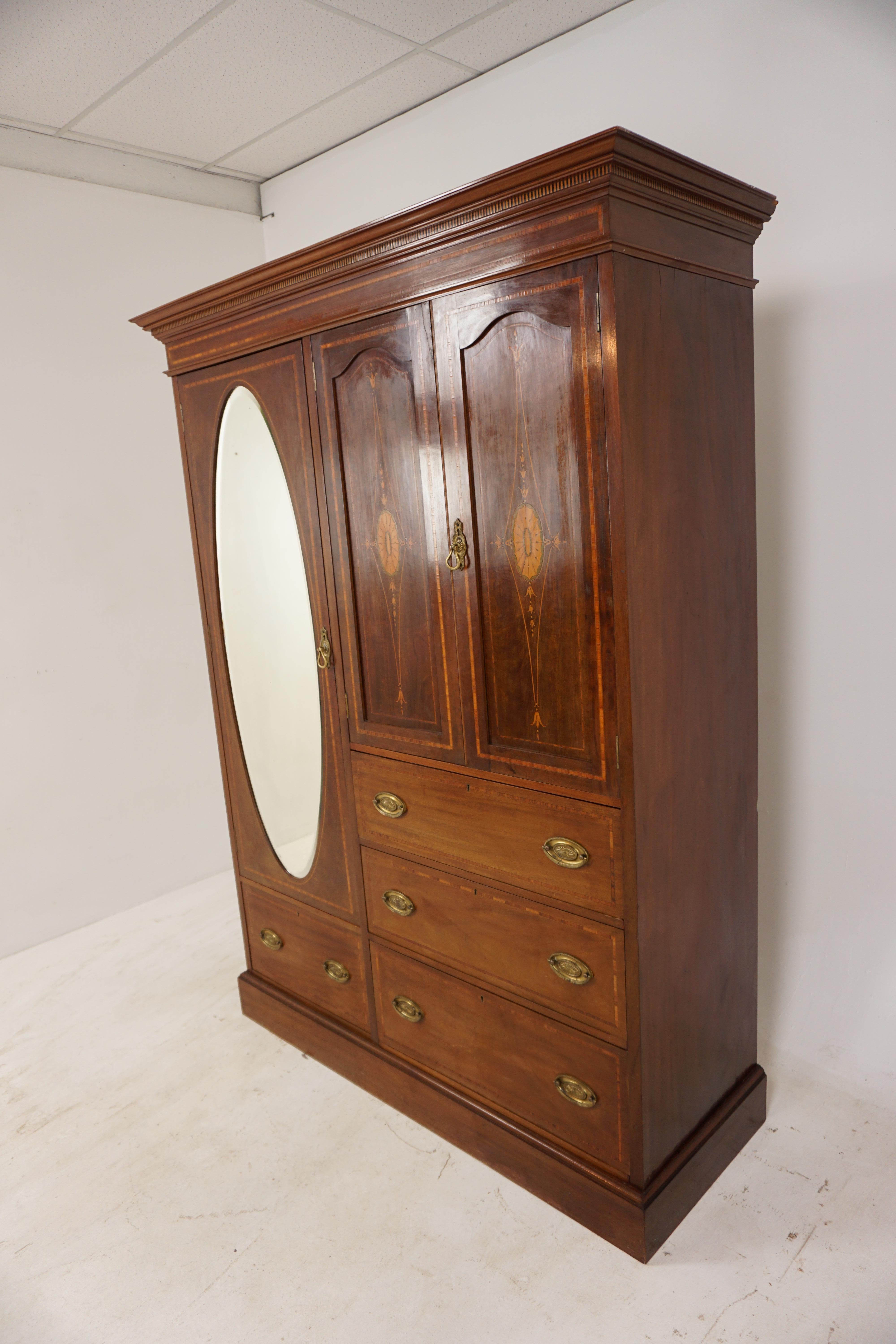 Antique Edwardian Inlaid Mahogany Ladies Compactum armoire, wardrobe, closet, Scotland 1900, B2693A

Scotland 1900
Solid Mahogany Veneer
Original finish
Has a dentil cornice top above a cross cut banded edges
To one side is a full length oval