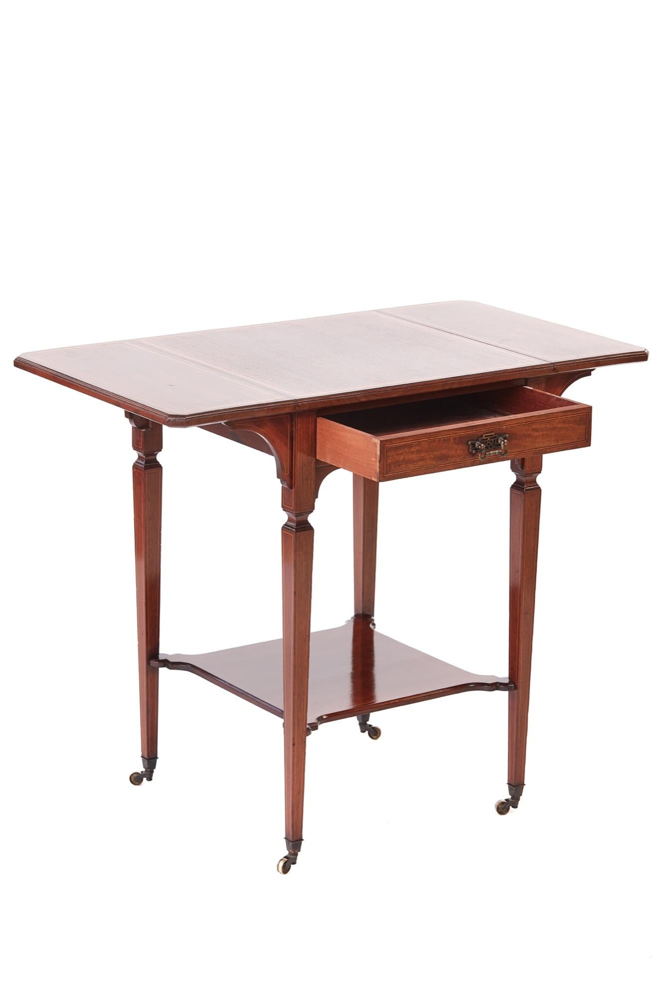 Fine quality Edwardian antique inlaid mahogany occasional / lamp table having a lovely mahogany top with two drop leaves and satinwood inlay, one frieze drawer with original handle, standing on four square elegant tapering legs with original brass