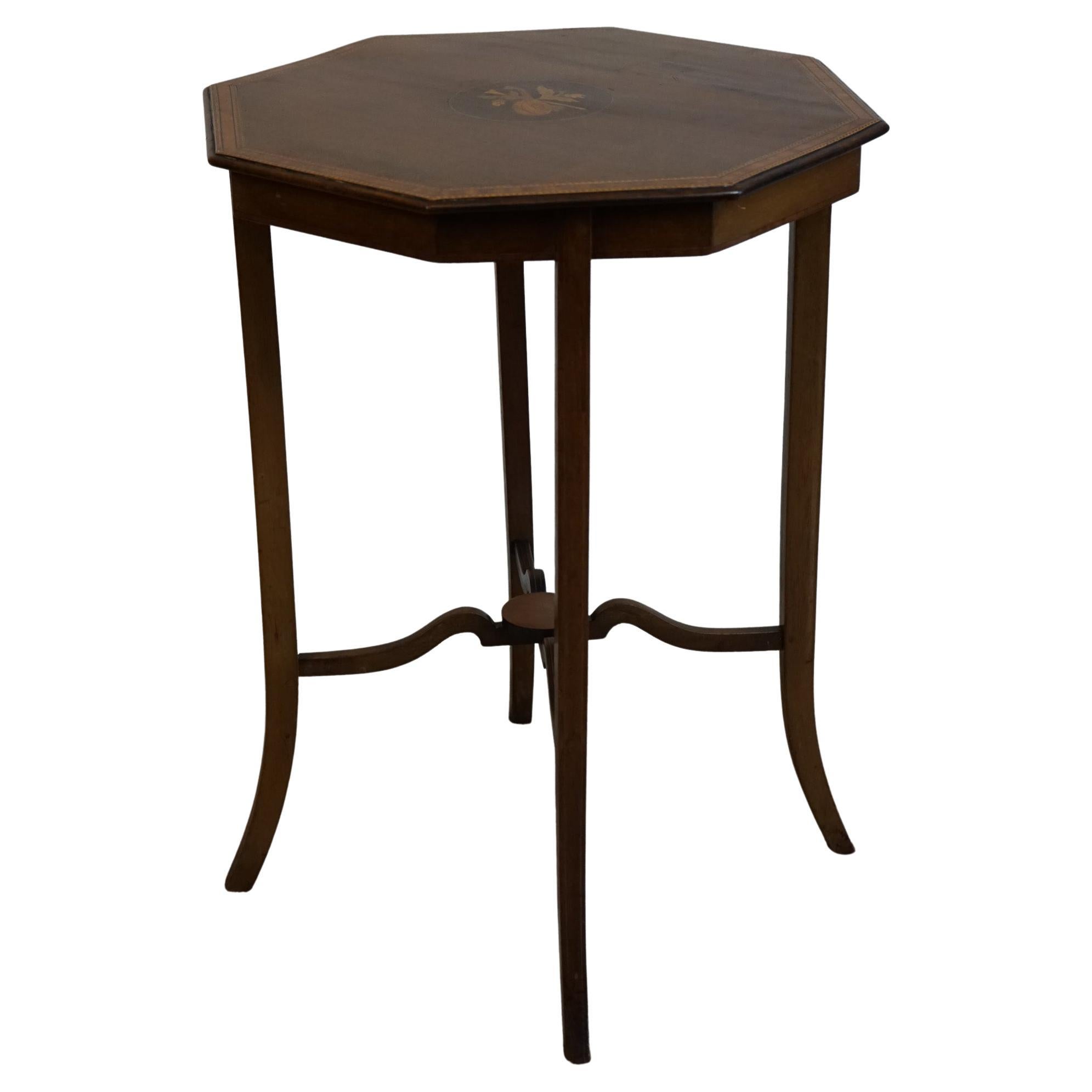 Antique Edwardian Inlaid  Side Table.
A beautiful inlaid side table dating 1900 In sturdy condition for the age . 
Don't hesitate to contact me if you have any questions.
Please have a closer look at the pictures because they form part of the