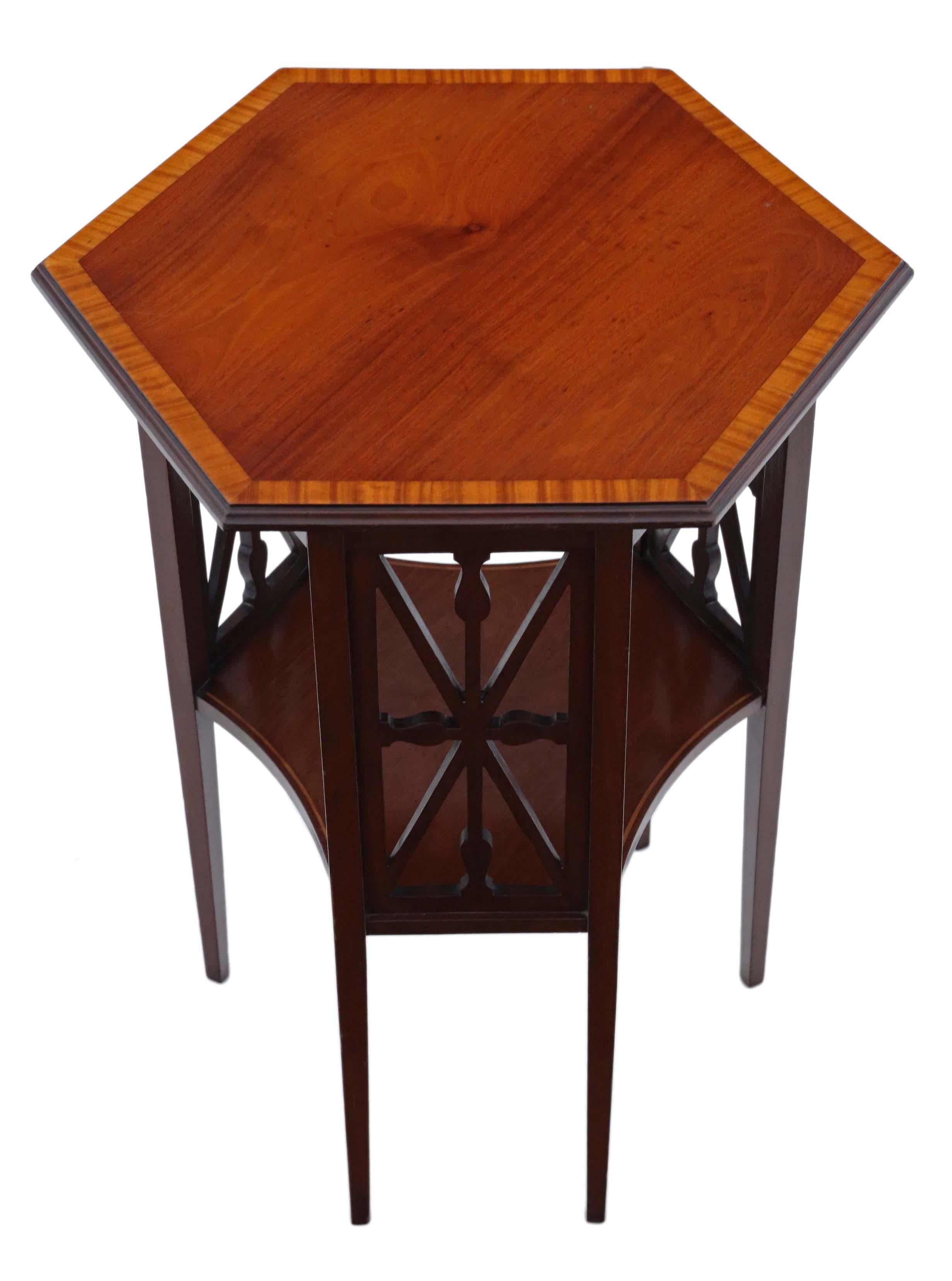 Antique fine quality Edwardian C1905 inlaid mahogany table occasional side centre window.

No loose joints and no woodworm. A rare decorative find, with lovely fret cut side decoration and inlaid crossbanding.

Would look great in the right