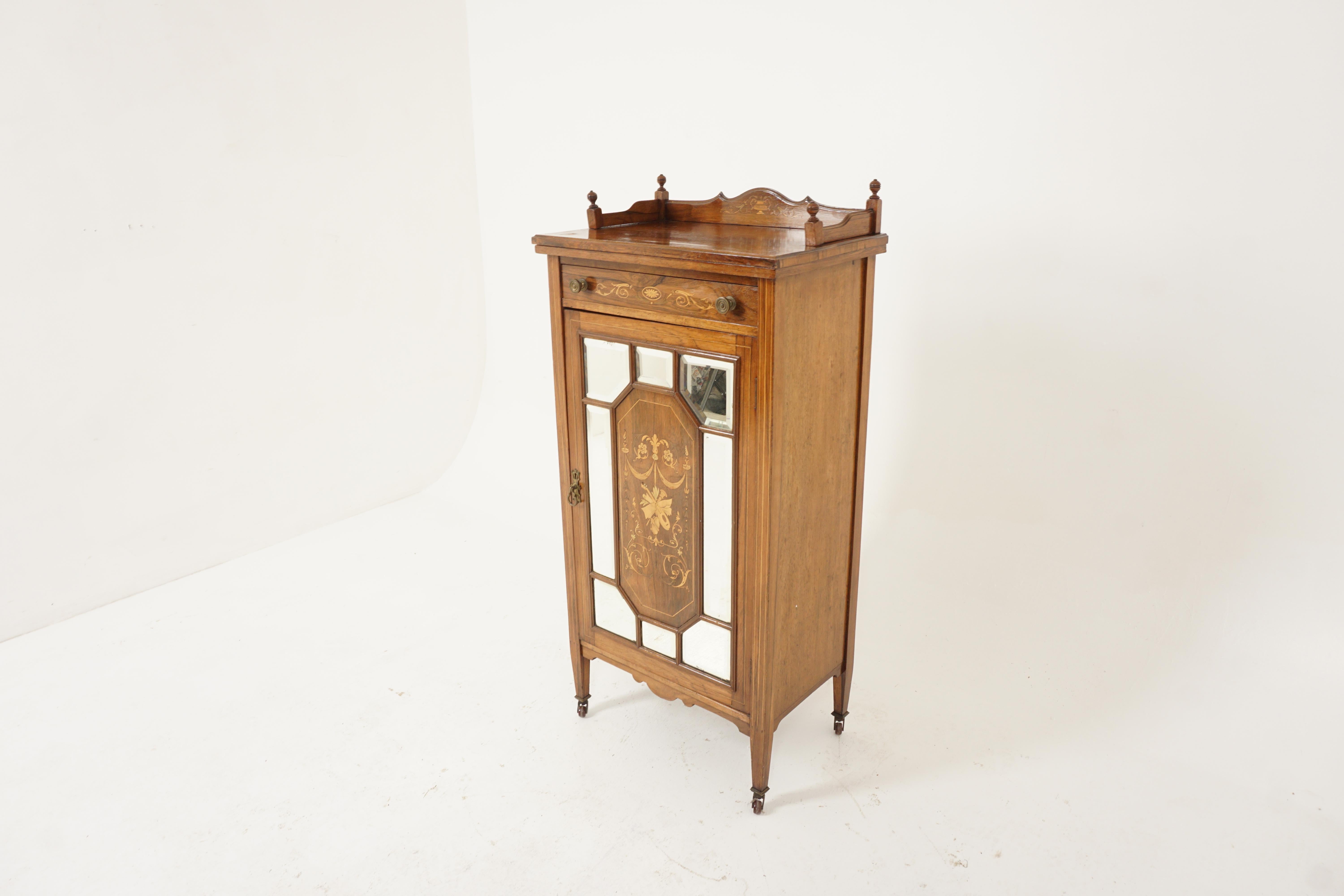 Antique Edwardian Inlaid Music cabinet, display cabinet, Scotland 1900, H614

Scotland 1900
Wood
Original finish
Three quarter gallery with finials
Single inlaid drawer with original hardware
Single door with marquetry
Inlaid (flowers with musical