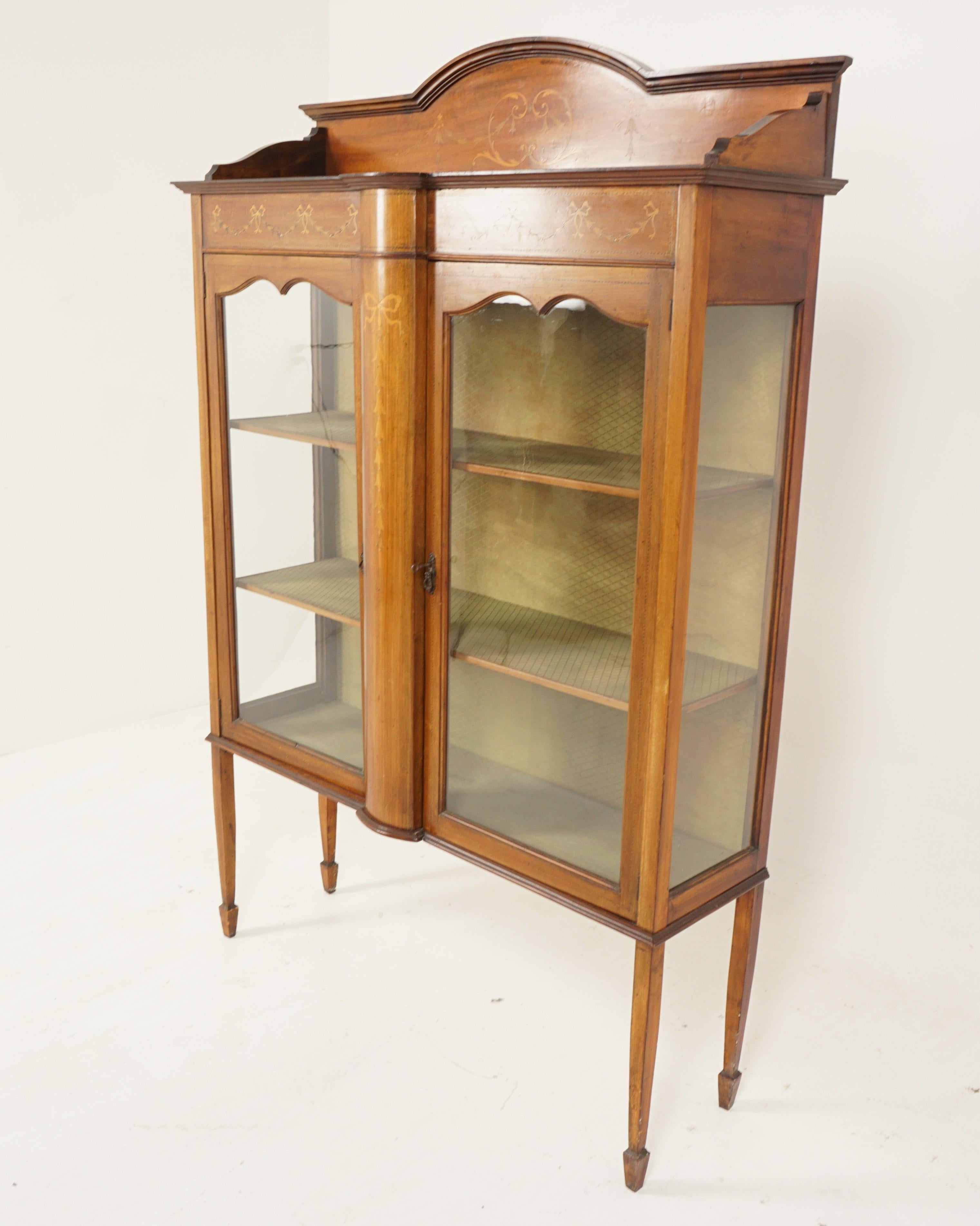 Antique Edwardian inlaid walnut display China cabinet, Scotland 1910, B2868

Scotland 1910
Solid walnut & veneer
Original finish
Three quarter inlaid gallery to the top
Inlaid frieze underneath
Pair of original glass doors open to reveal two