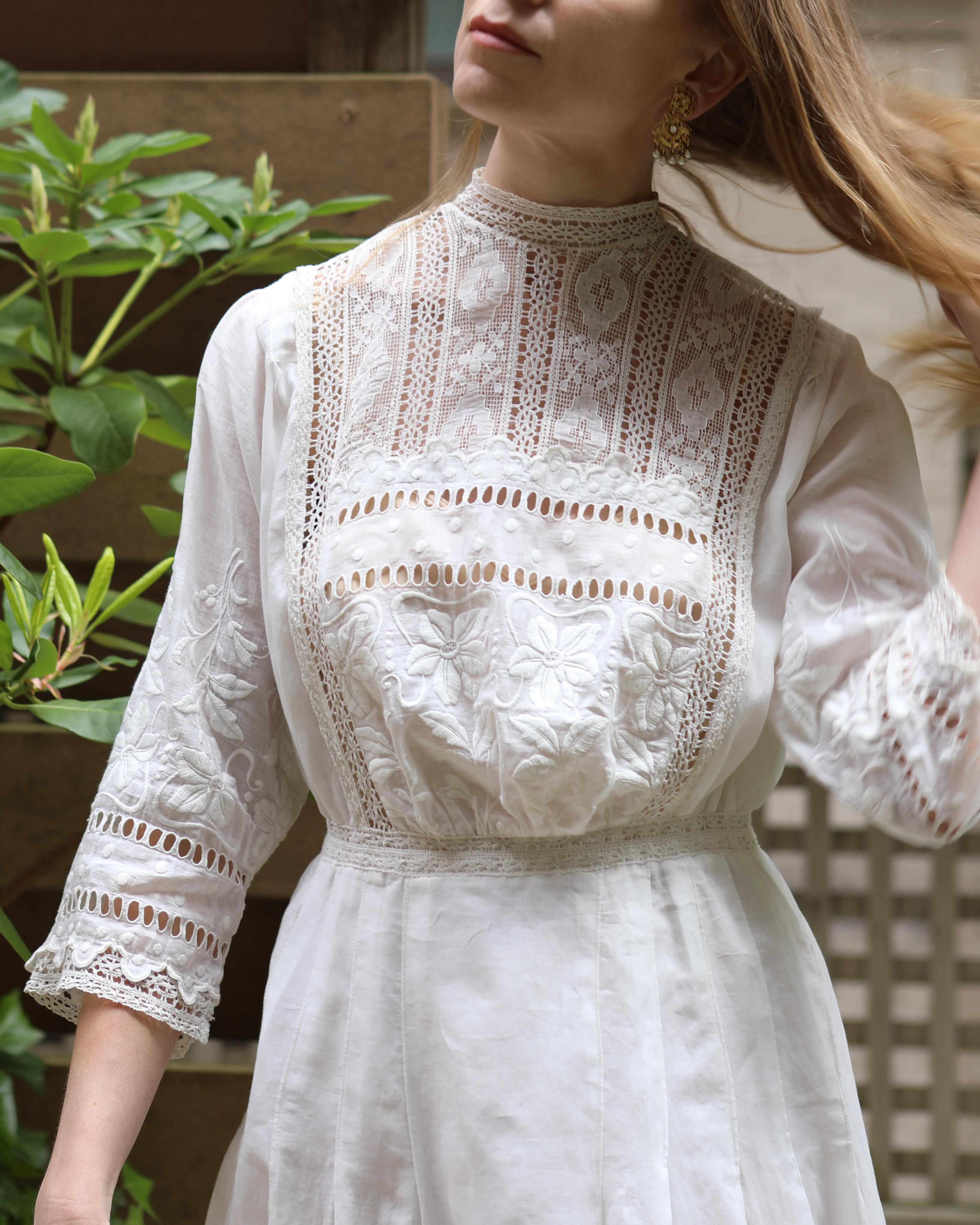 This incredible antique Edwardian two-piece dress was made in the early 19th century, and it is a stunning, museum-worthy (and museum quality) work of art. These Victorian/Edwardian era dresses are commonly mis-referred to as tea dresses or tea