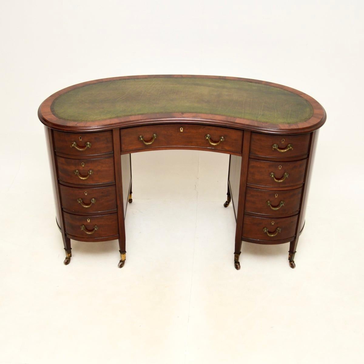 A superb antique Edwardian leather top kidney shaped desk. It was made in England, it dates from around the 1900-1910 period.

The quality is outstanding, this is extremely well made and is a very useful size. There is a gorgeous inset leather top