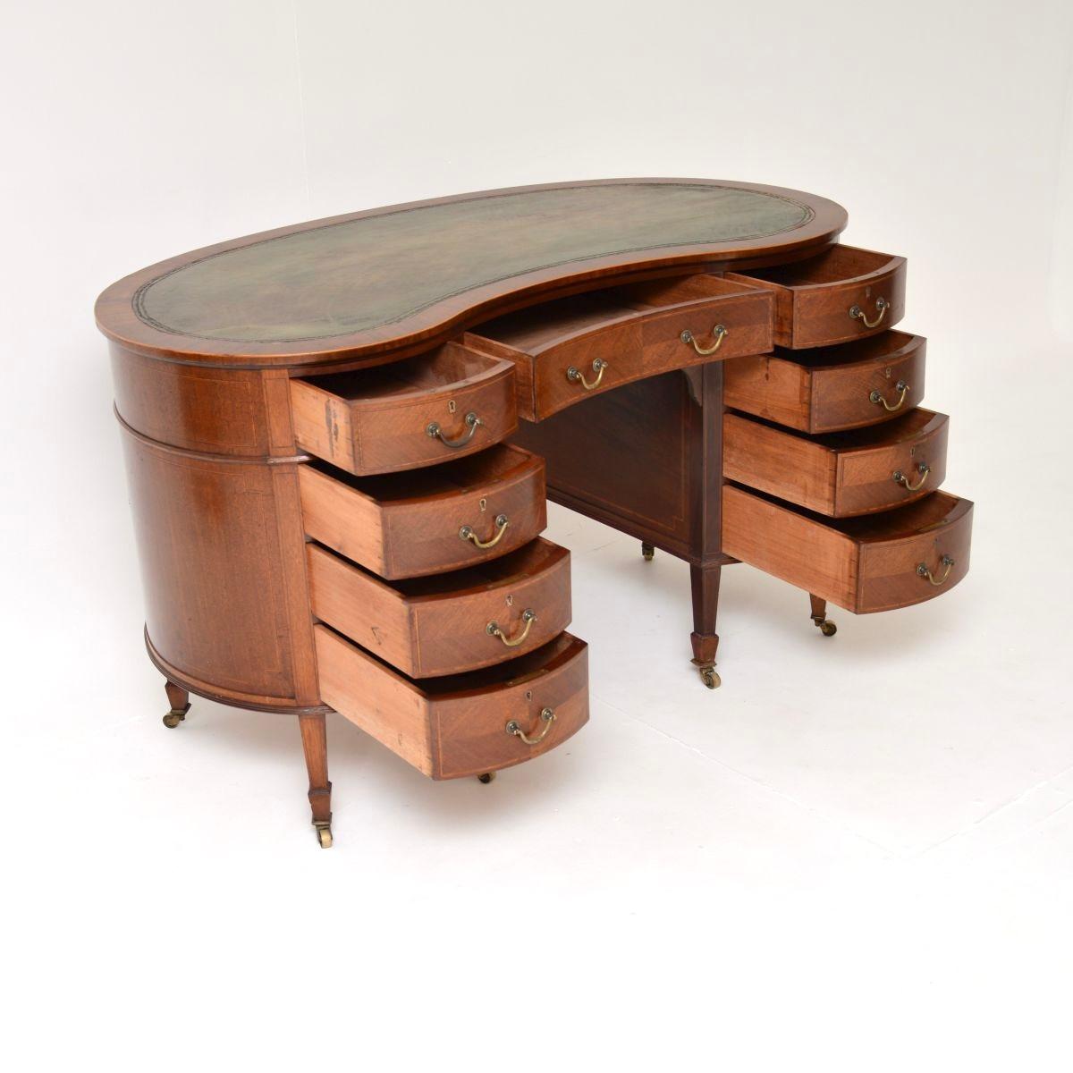 A superb antique Edwardian leather top kidney shaped desk. It was made in England, it dates from around the 1900-1910 period.

The quality is outstanding, this is extremely well made and is a very useful size. There is a gorgeous inset leather top