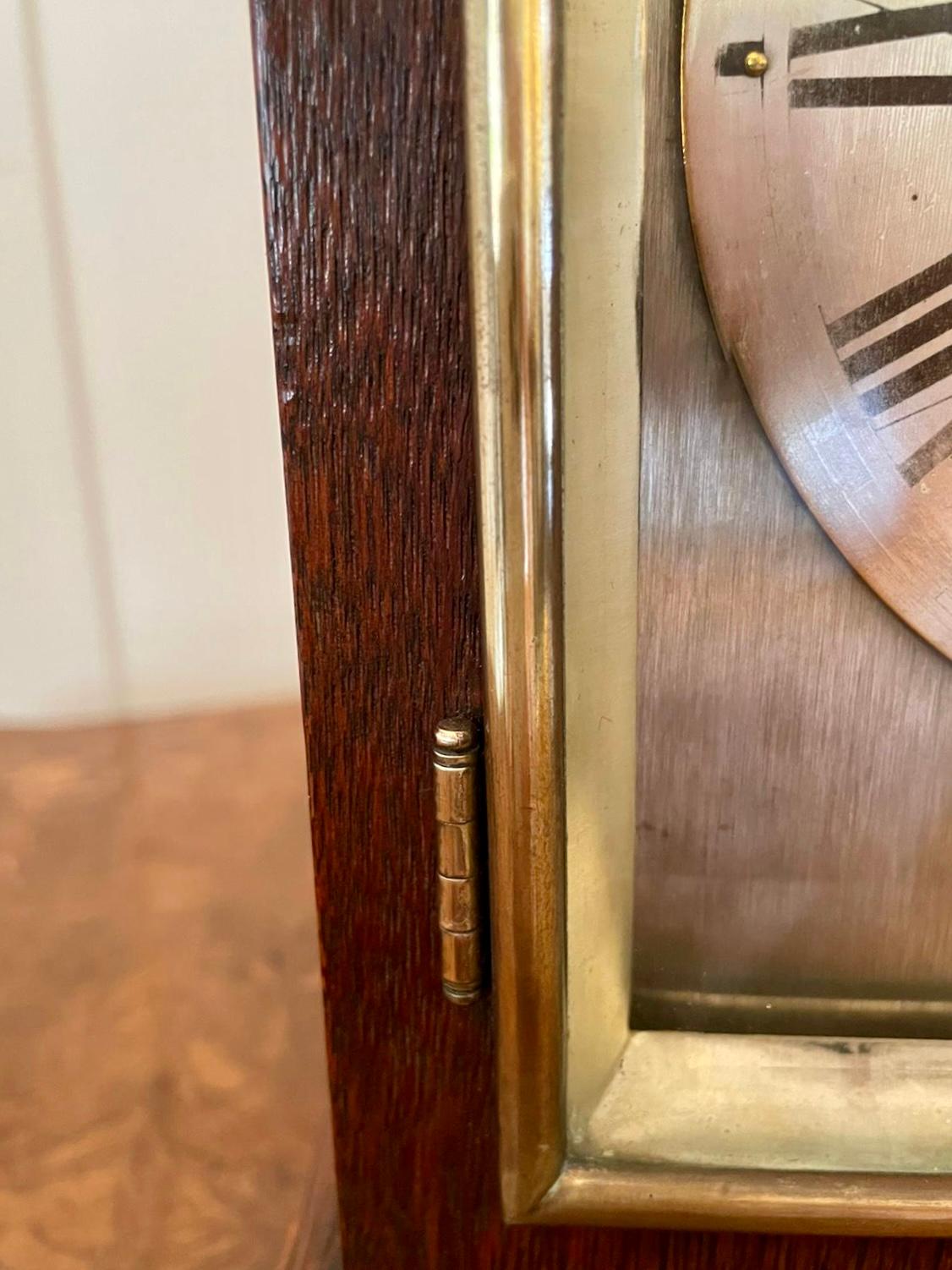 Antique Edwardian mahogany eight day chiming mantel clock having a quality mahogany arched top case, sliver face with original hands, eight day chiming movement with original key.

In good working order.

Measures: H 28.5cm
W 20cm
D