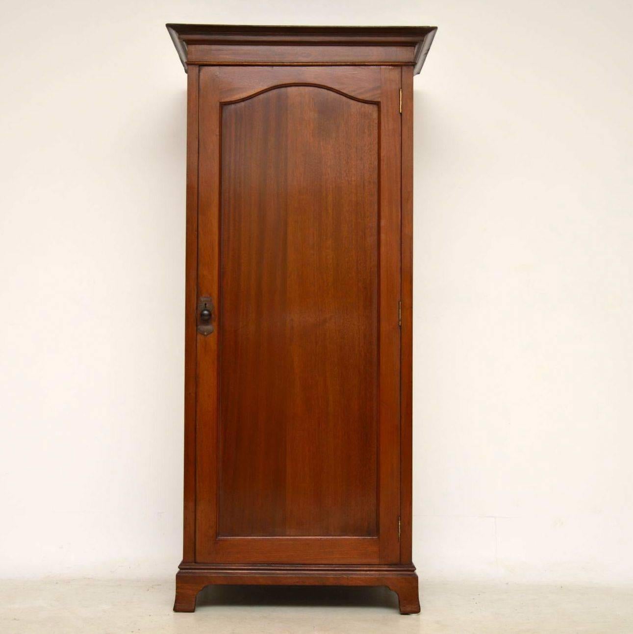 This small antique mahogany wardrobe could work well as a hall cupboard. In fact, I think that was what it was designed for. Perfect for hanging coats in & shoes at the bottom. There’s a hanging rail inside with sliding hooks attached. This wardrobe