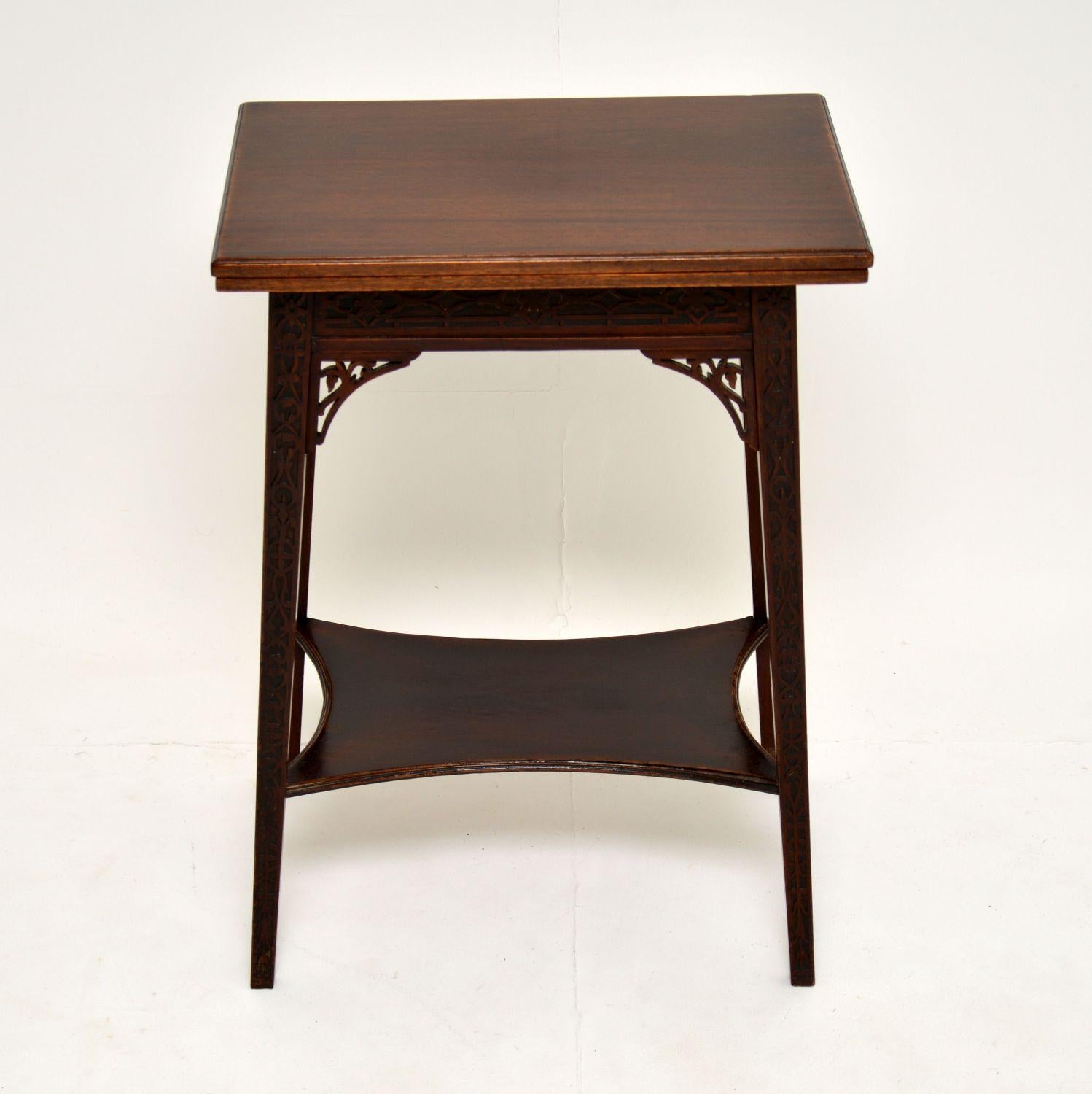 This stunning and unusual antique Edwardian side table, has a flap over top which doubles the top surface and turns it into a tea table or card table. This is beautifully made from mahogany, it dates from the 1890-1900 period.

There is fine