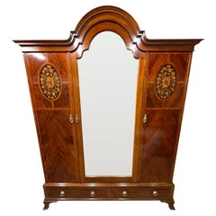 Antique Edwardian Mahogany Three-Door Marquetry Inlaid Wardrobe with Mirror Antique Edwardian Mahogany Three-Door Marquetry Inlaid Wardrobe with Mirror