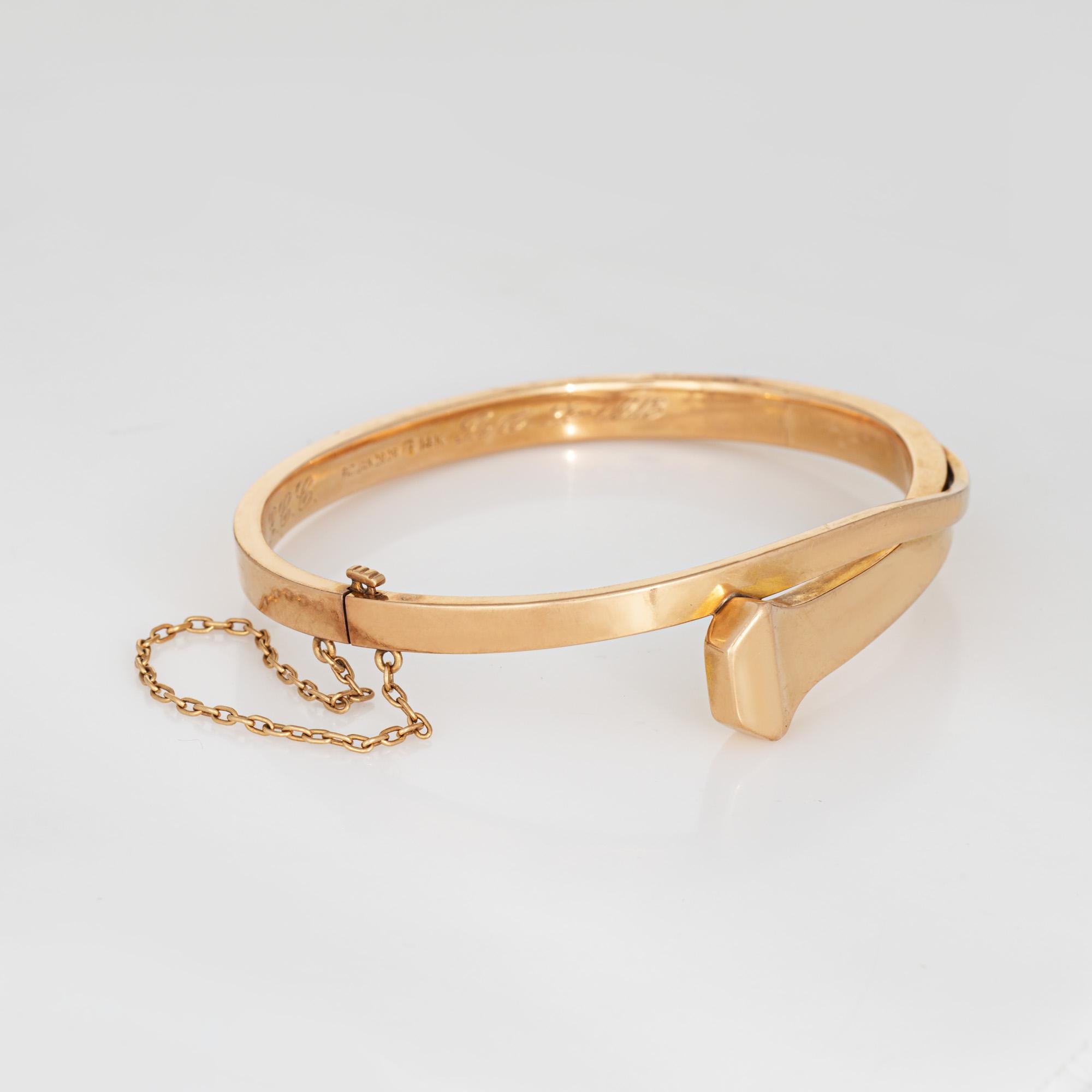 Bracelet à clous ancien, élégant et finement détaillé, réalisé en or rose 14 carats (vers 1913). 

Un magnifique bijou ancien de fabrication américaine, réalisé par la célèbre société I.L.A.W. de Newark, New Jersey, la capitale de la production de