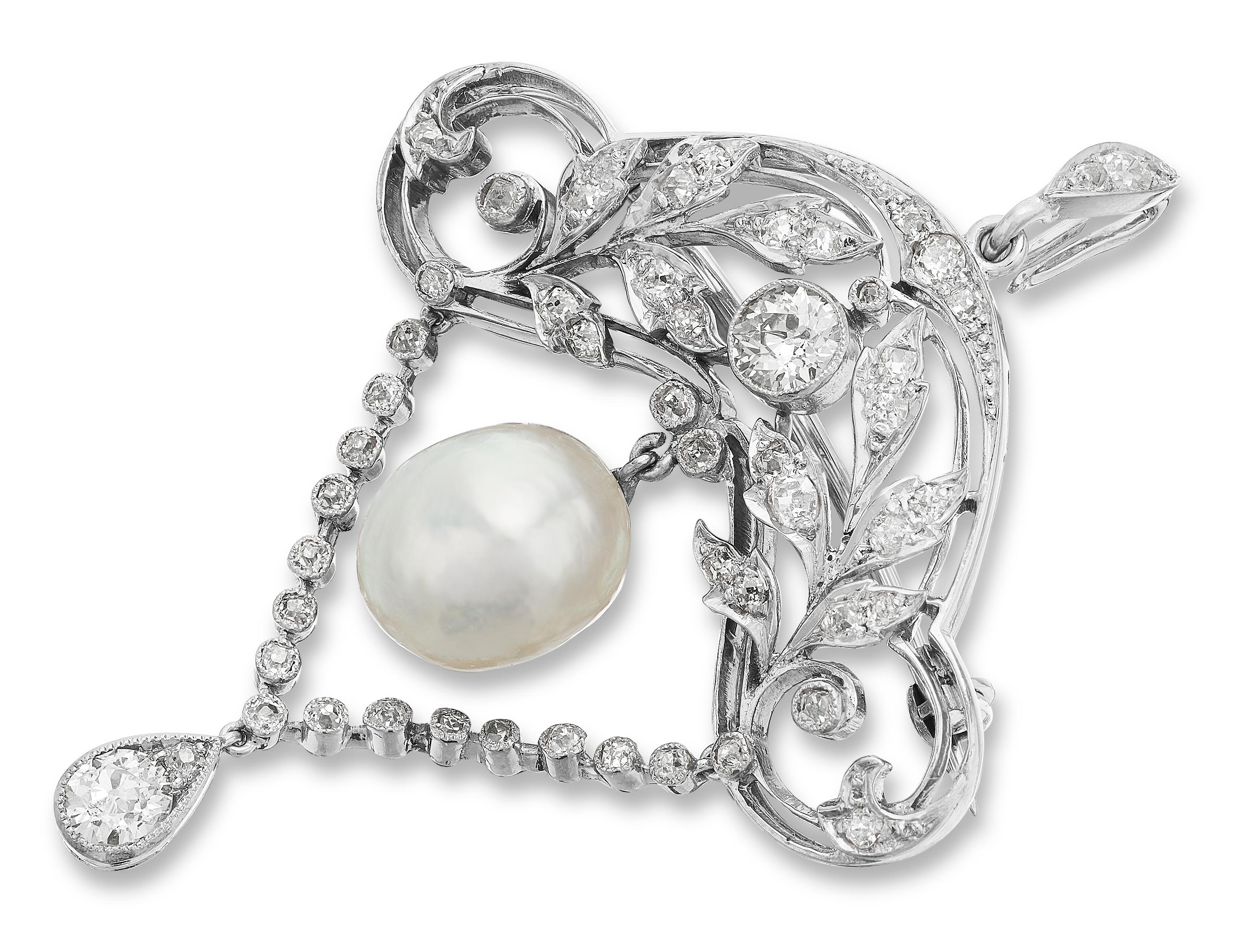 Edwardian Brooch/Pendant. Encrusted with diamonds and natural pearl center set in 18 ct white gold. Today, natural pearls are extremely rare. Only 1 in about 10,000 wild oysters will yield a pearl and of those, only a small percentage achieve the