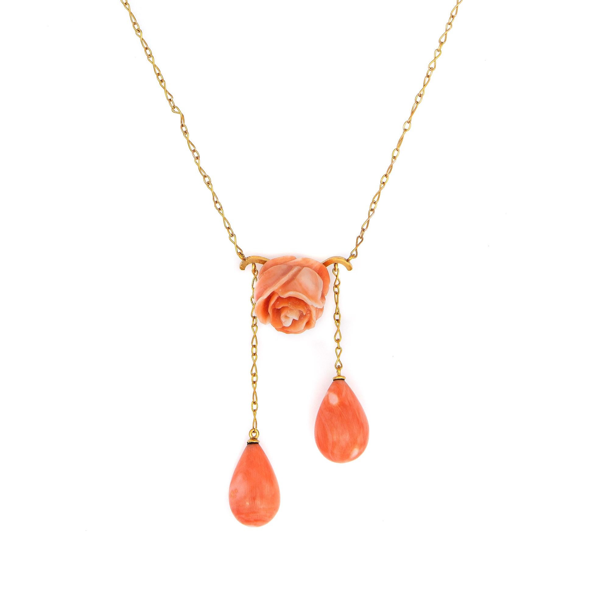 Finely detailed antique Edwardian era negligee drop necklace (circa 1900s to 1910s), crafted in 14k yellow gold. 

Carved coral flower measures 12mm. The coral drops measure 7.5mm x 9mm. The coral is in excellent condition and free of cracks or