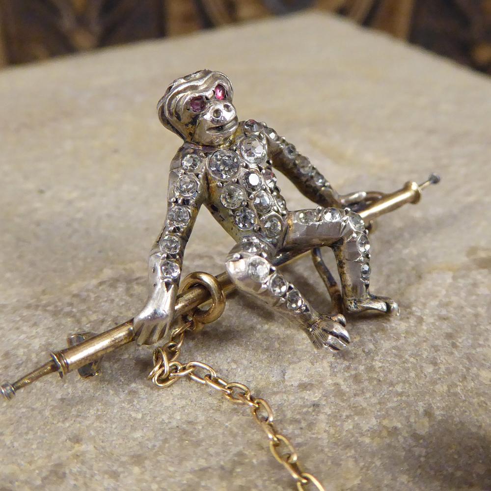 Amusing novelty brooches were popular in the Victorian and Edwardian periods with piece such as this being a fun way of someone expressing their personality. This playful brooch depicts two monkey, one hanging playfully from a chain and the other
