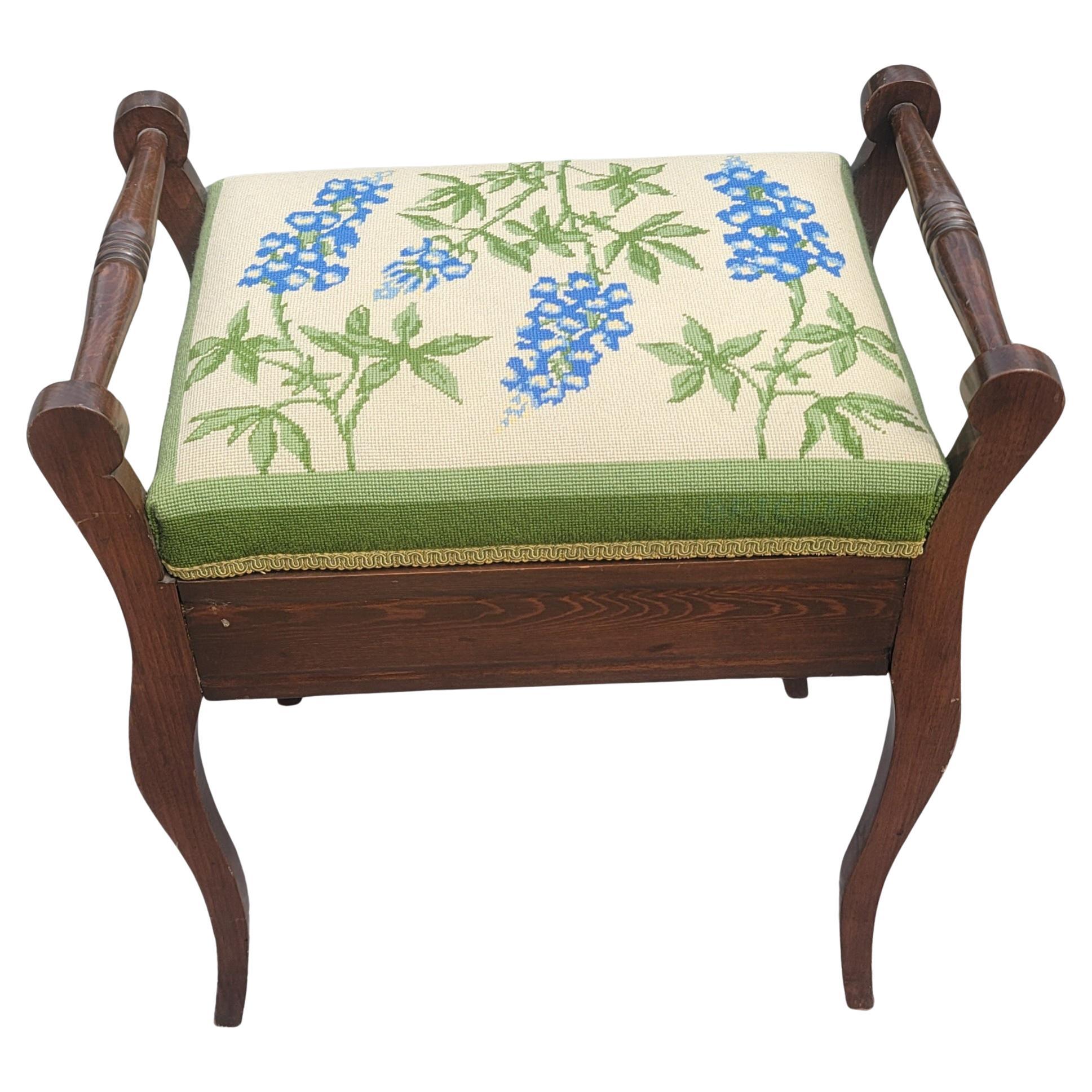 A beautiful, totally refinished and needlepoint reupholstered Stool bench for use by the bed side, as vanity bench or piano Stool. This bench Stool is sturdy, beautiful and clean. A true gem. Measures 20.25