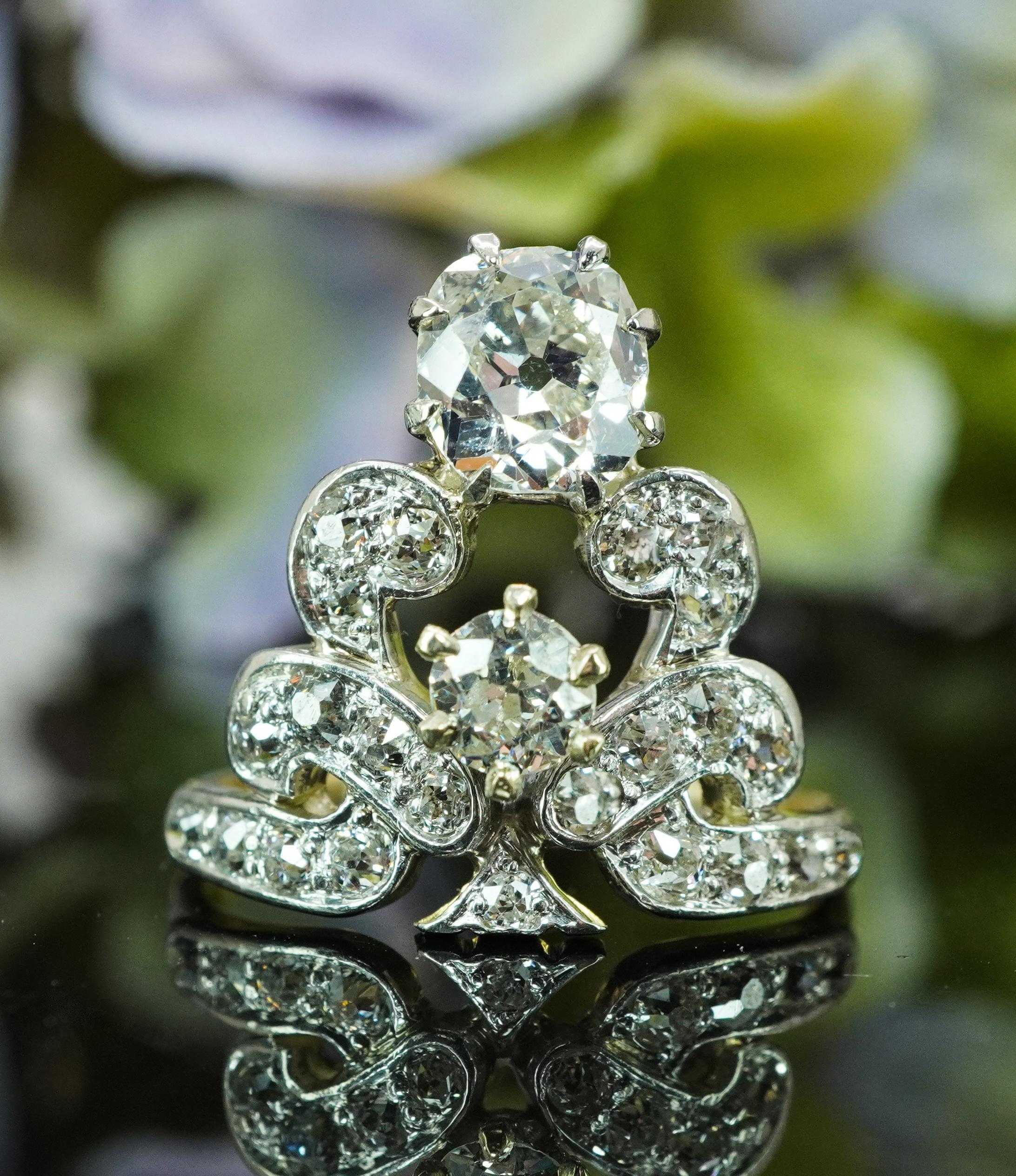   Antique Edwardian Old European Cushion Mine cut Diamond Crown Ring 14K Gold Estate

This beautiful estate ring is crafted in luxurious 14K white and yellow gold. There is a large old mine cushion cut diamond set on top. It is .77ct actual weight