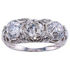 edwardian 3 stone diamond ring Antique Edwardian Old Mine Cut Diamond Three-Stone Platinum Ring