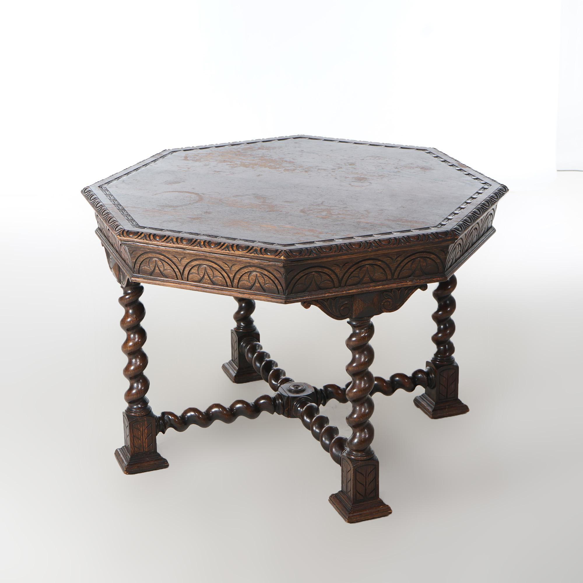 Table centrale octogonale ancienne en chêne sculpté de style édouardien, avec pieds torsadés en corde et brancards, vers 1910

Dimensions : 30.5 